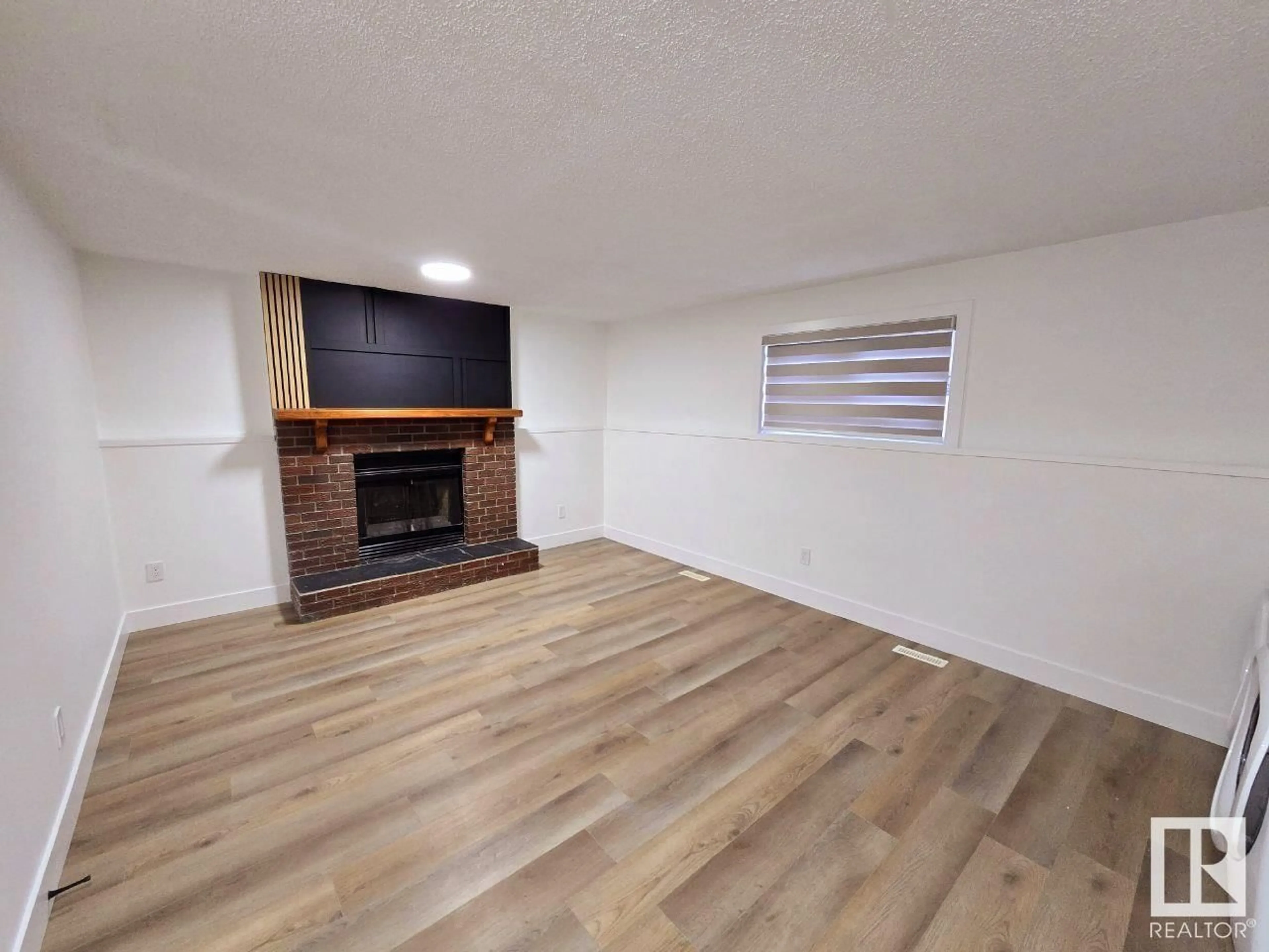 A pic of a room, wood floors for 1135 49A ST NW, Edmonton Alberta T6L4C5