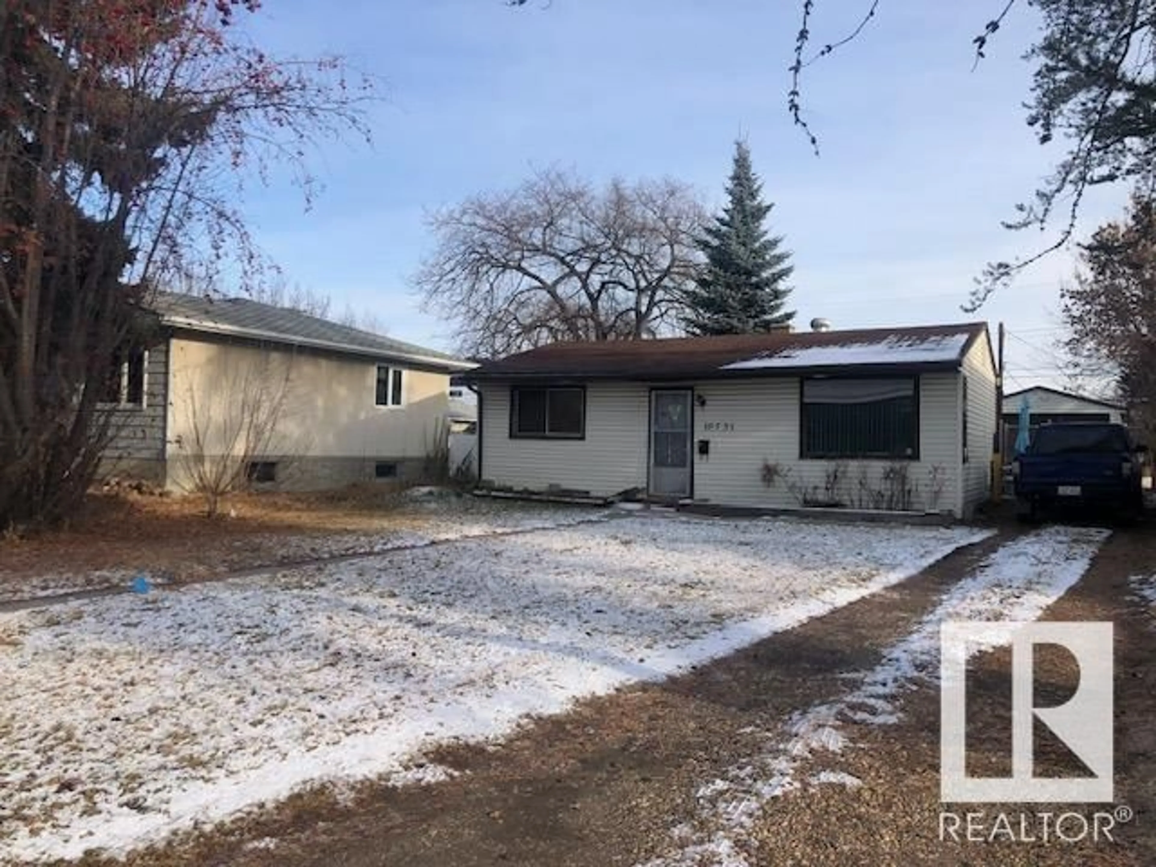 Frontside or backside of a home, the front or back of building for 10731 152 ST NW, Edmonton Alberta T5P1Z2