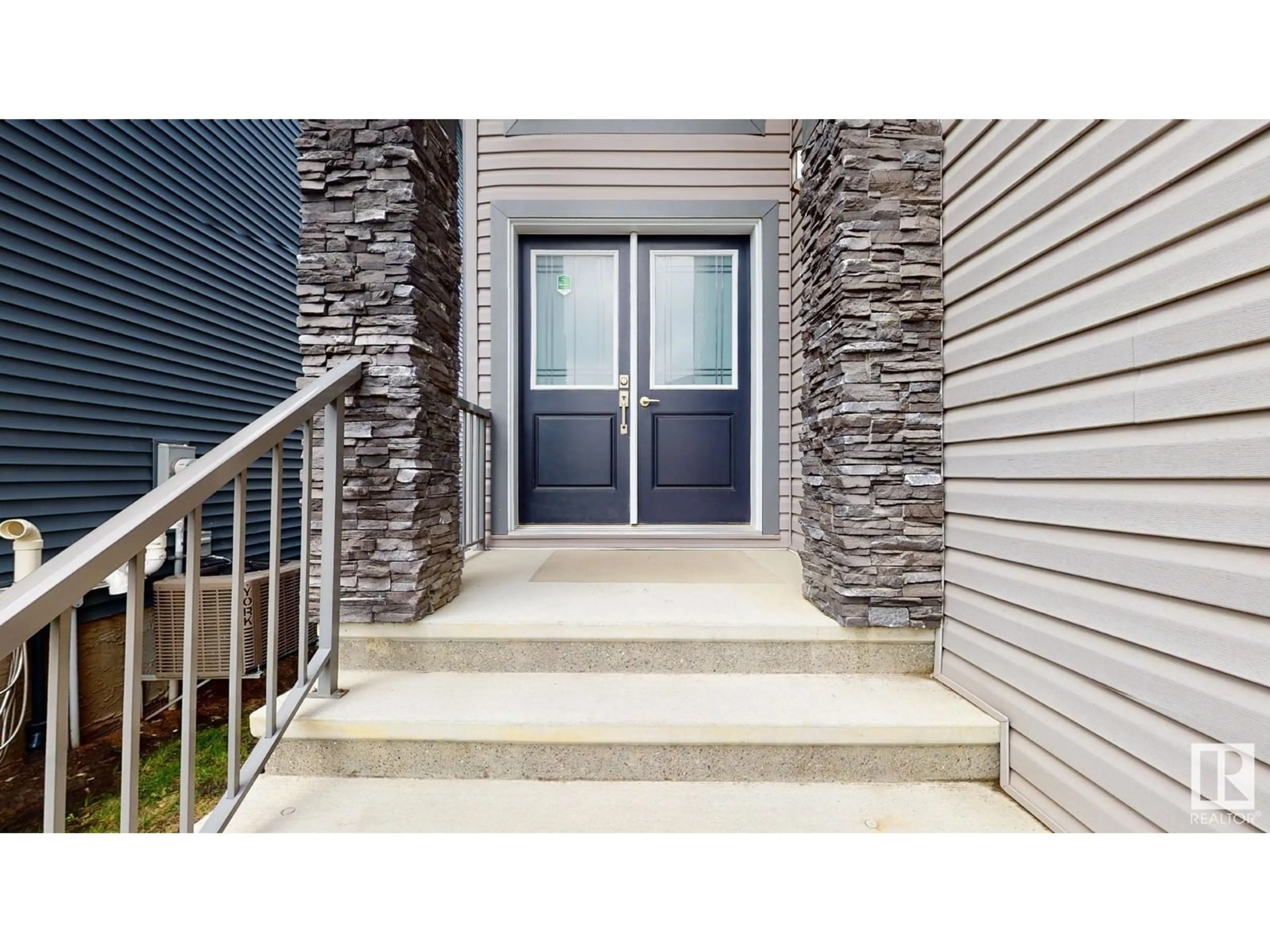 Indoor entryway, cement floor for 4160 Charles LI SW, Edmonton Alberta T6W3H1