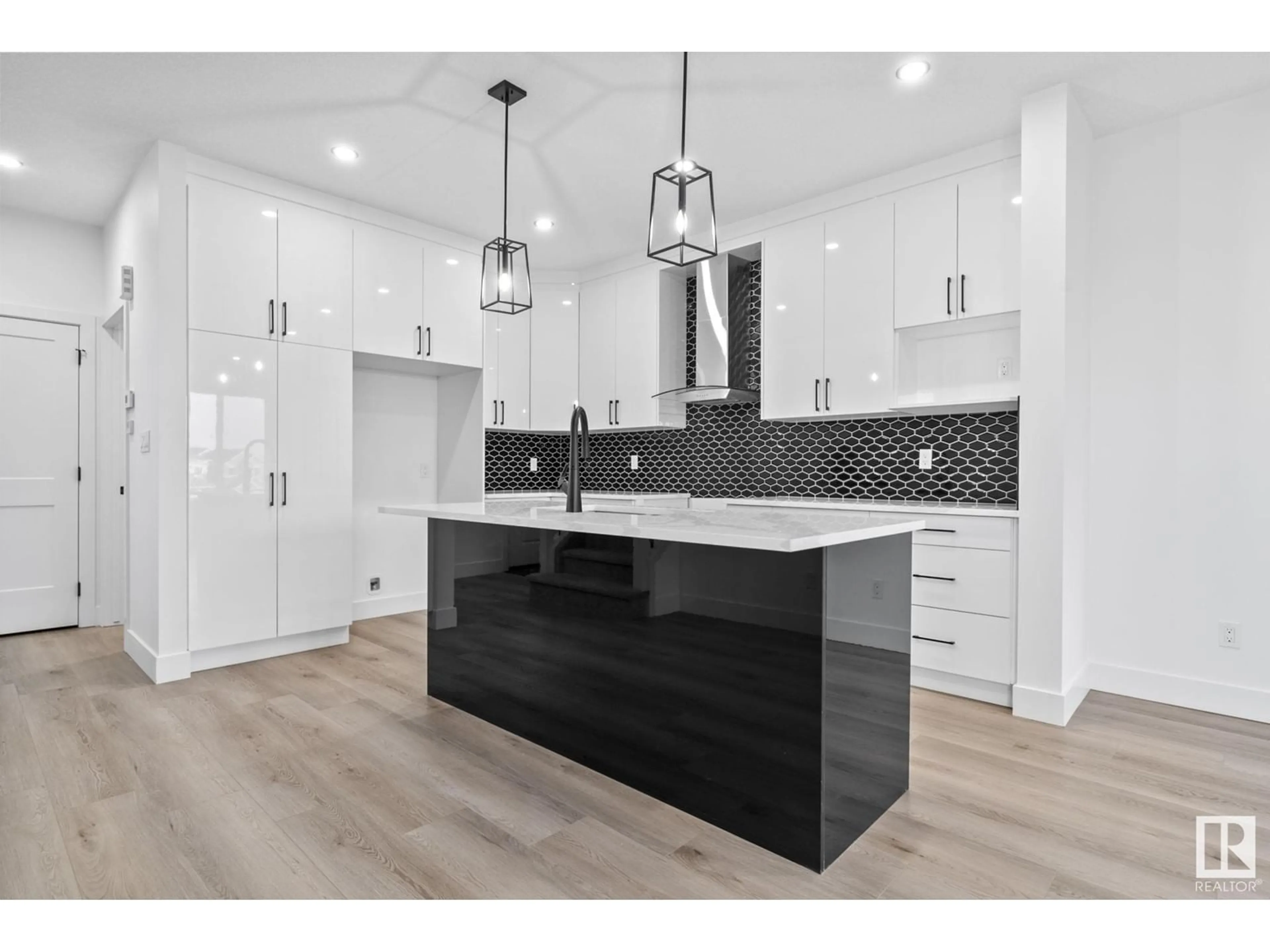 Open concept kitchen for 707 31 AV NW, Edmonton Alberta T6T1J2