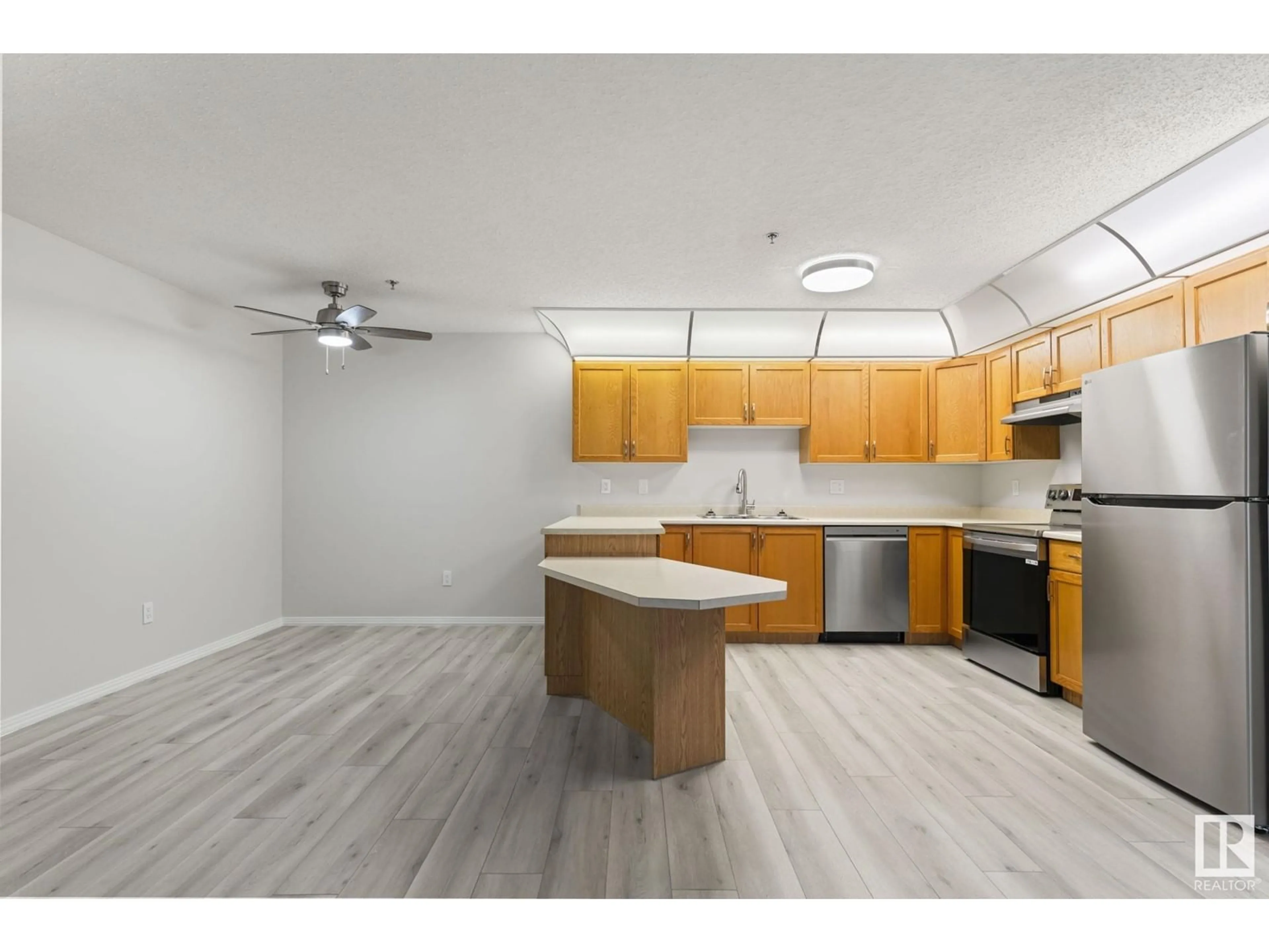 Standard kitchen, wood floors for #103 11915 106 AV NW, Edmonton Alberta T5H0S2