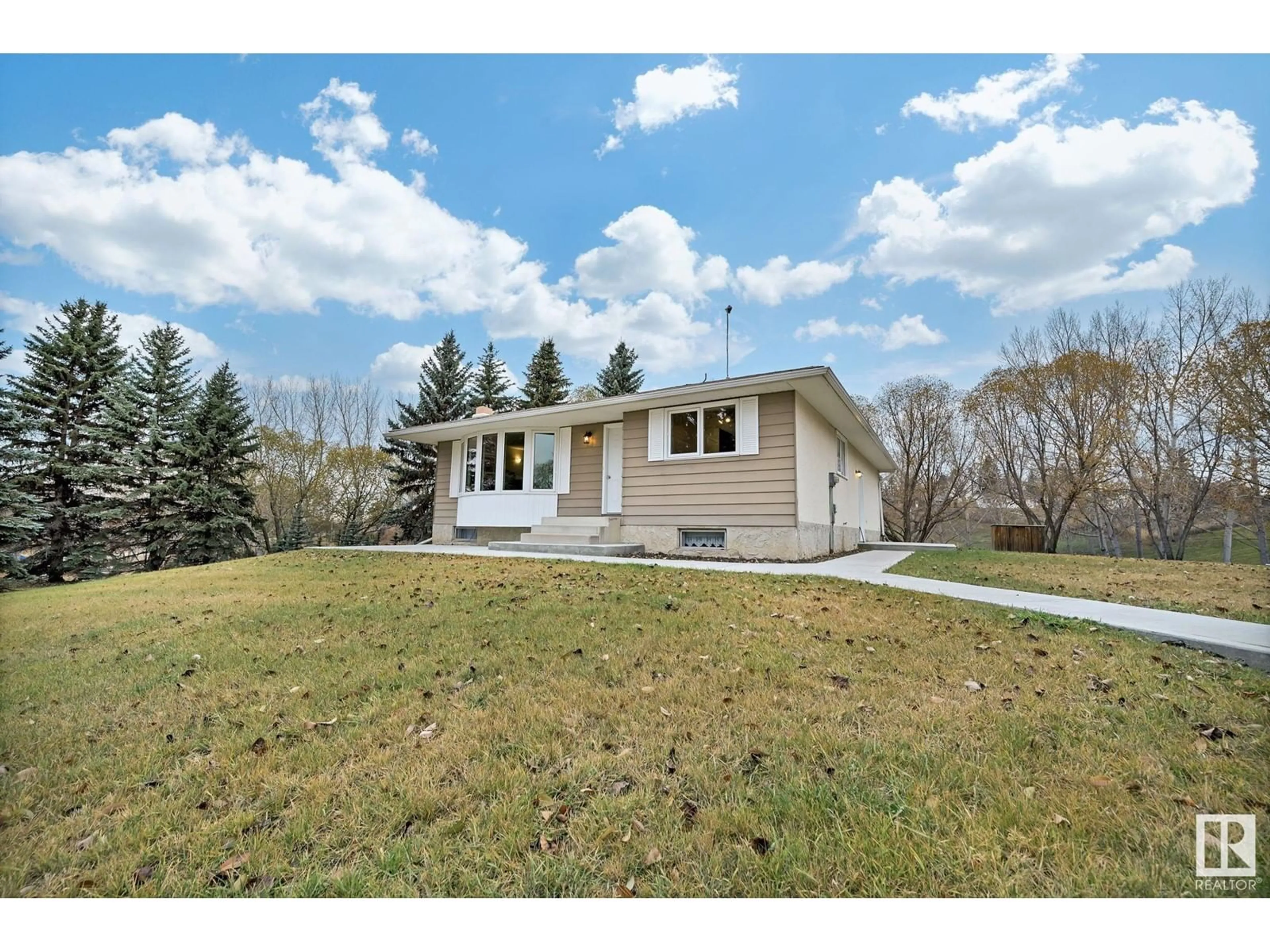 A pic from exterior of the house or condo, the fenced backyard for 2 53219 RGE ROAD 271, Rural Parkland County Alberta T7X3L9