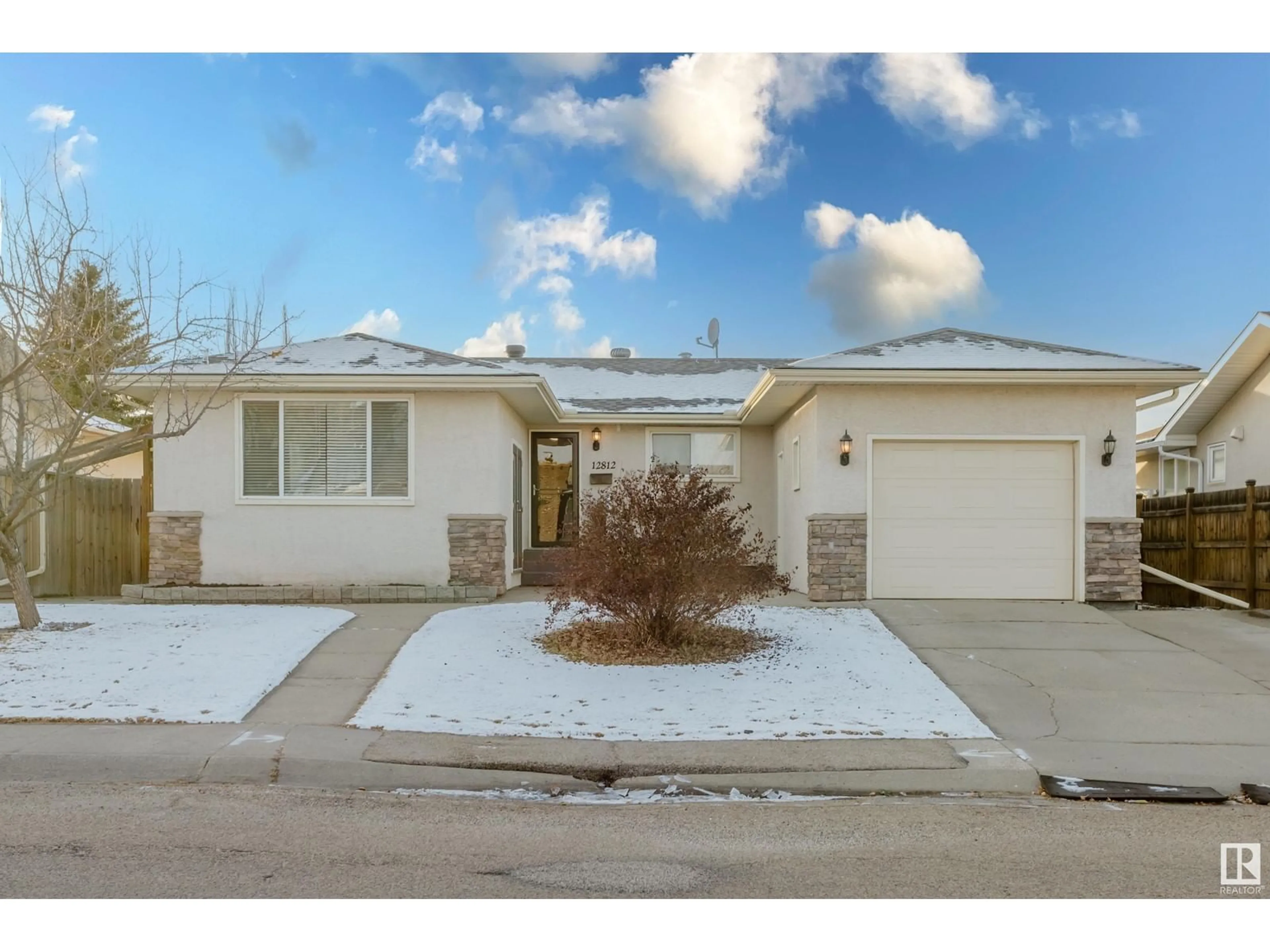 Frontside or backside of a home, the street view for 12812 47 ST NW, Edmonton Alberta T5A2J9