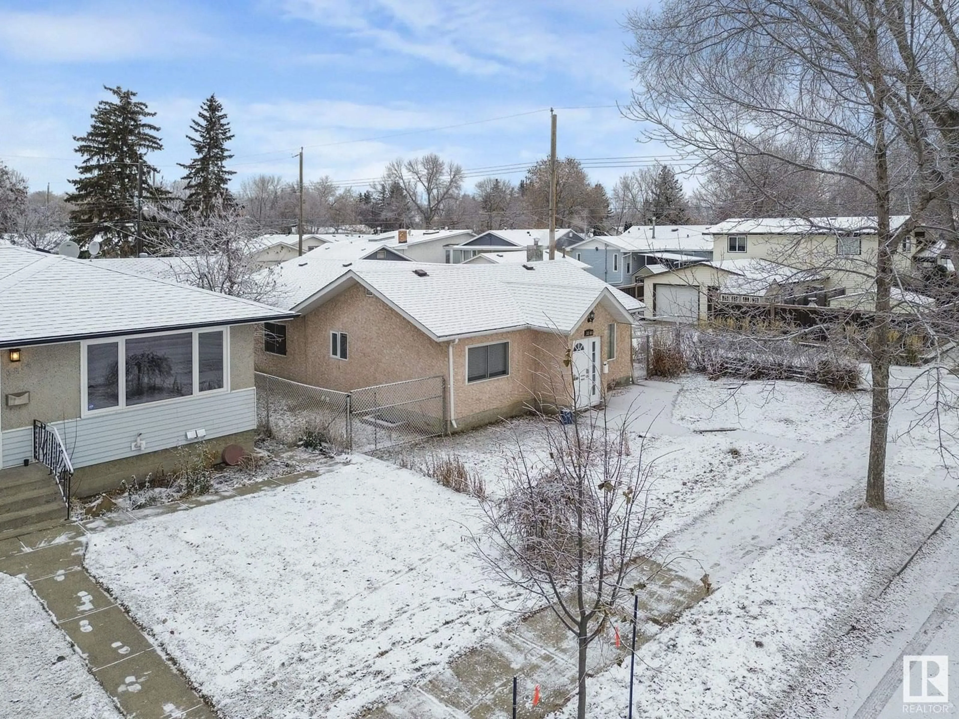 Frontside or backside of a home, the street view for 3804 109 AV NW, Edmonton Alberta T5W0G8