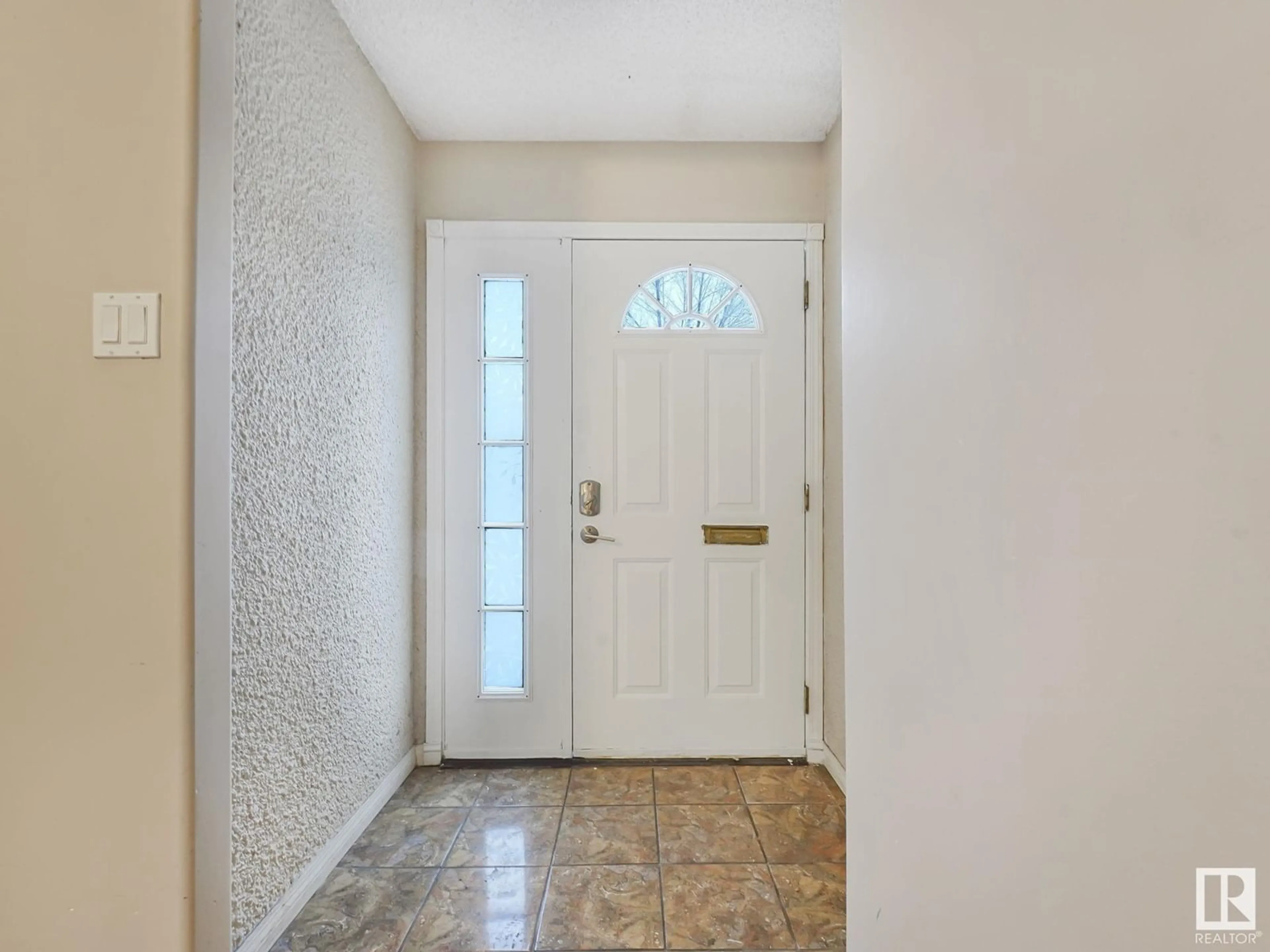 Indoor entryway, wood floors for 3804 109 AV NW, Edmonton Alberta T5W0G8