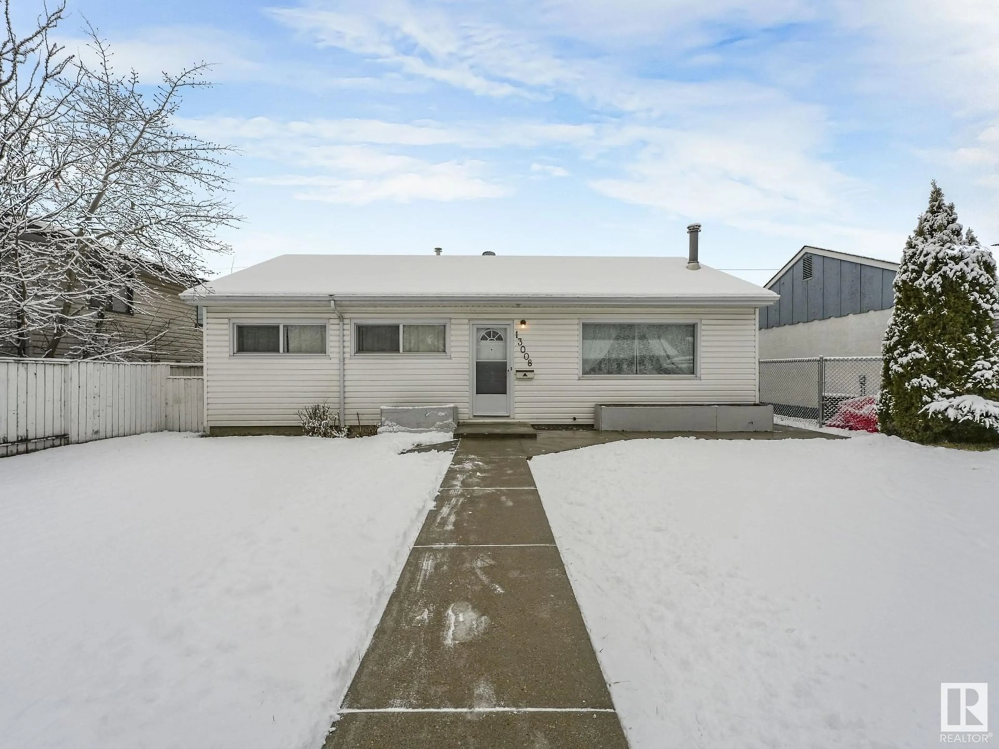 Frontside or backside of a home, the street view for 13008 133 ST NW, Edmonton Alberta T5L1T1