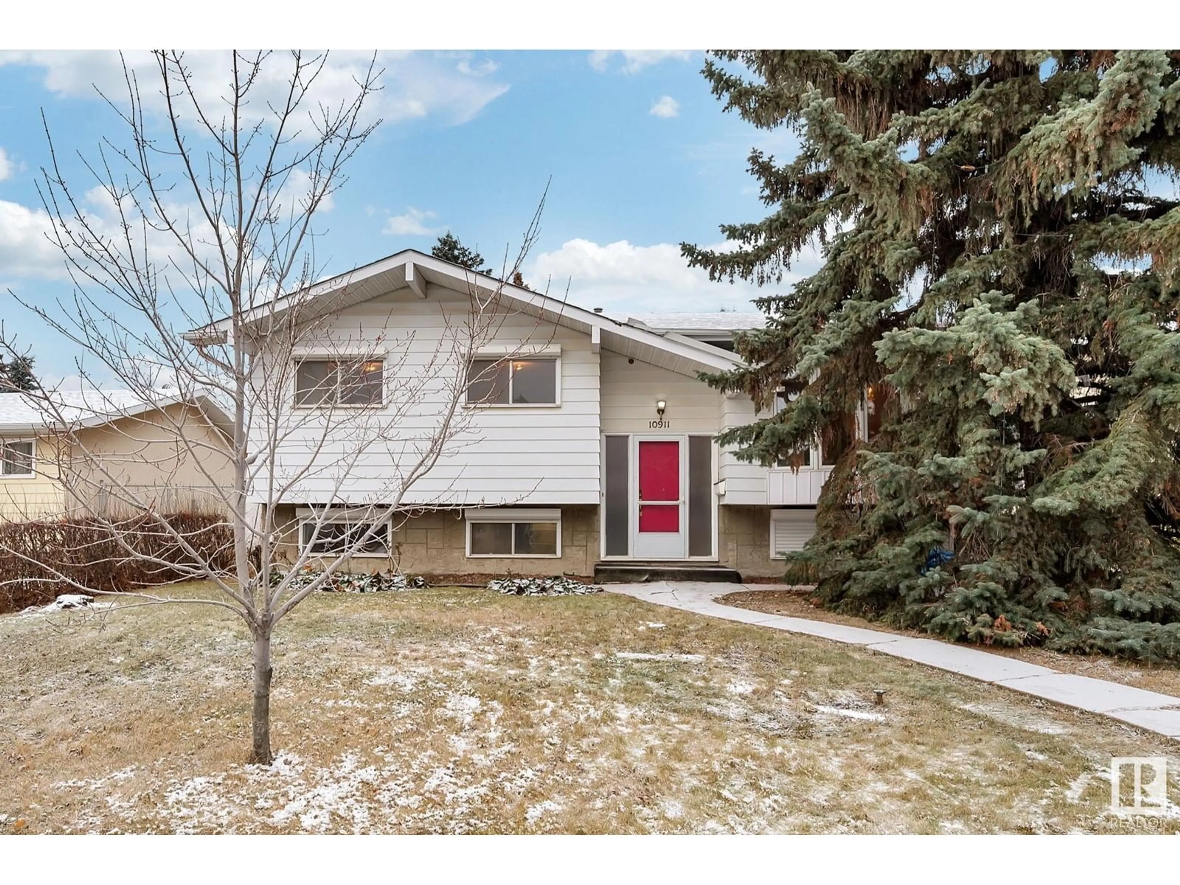 Frontside or backside of a home for 10911 43 AV NW, Edmonton Alberta T6J2R3