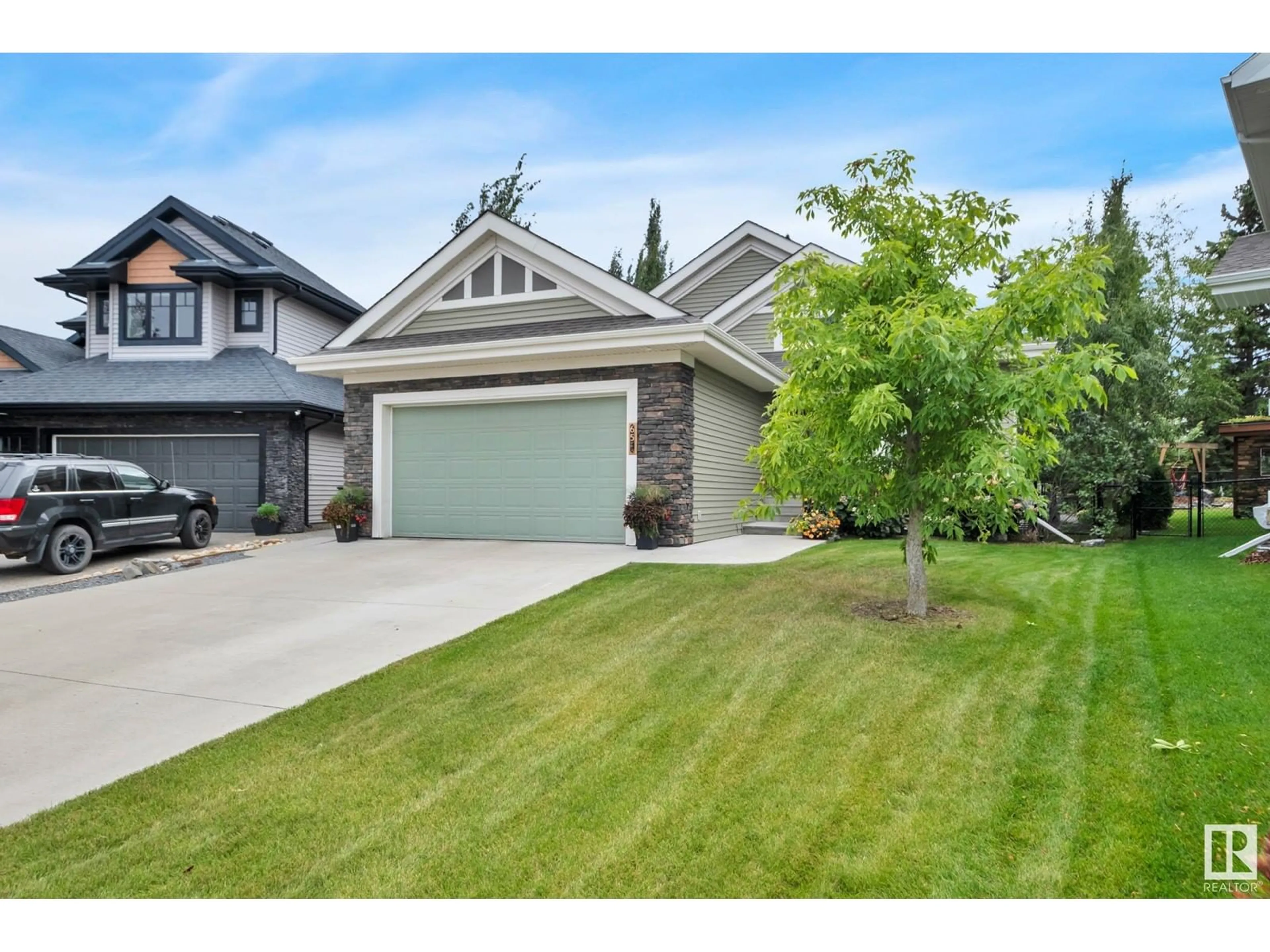 Frontside or backside of a home, the street view for 65 LINCOLN GR, Spruce Grove Alberta T7X0N5