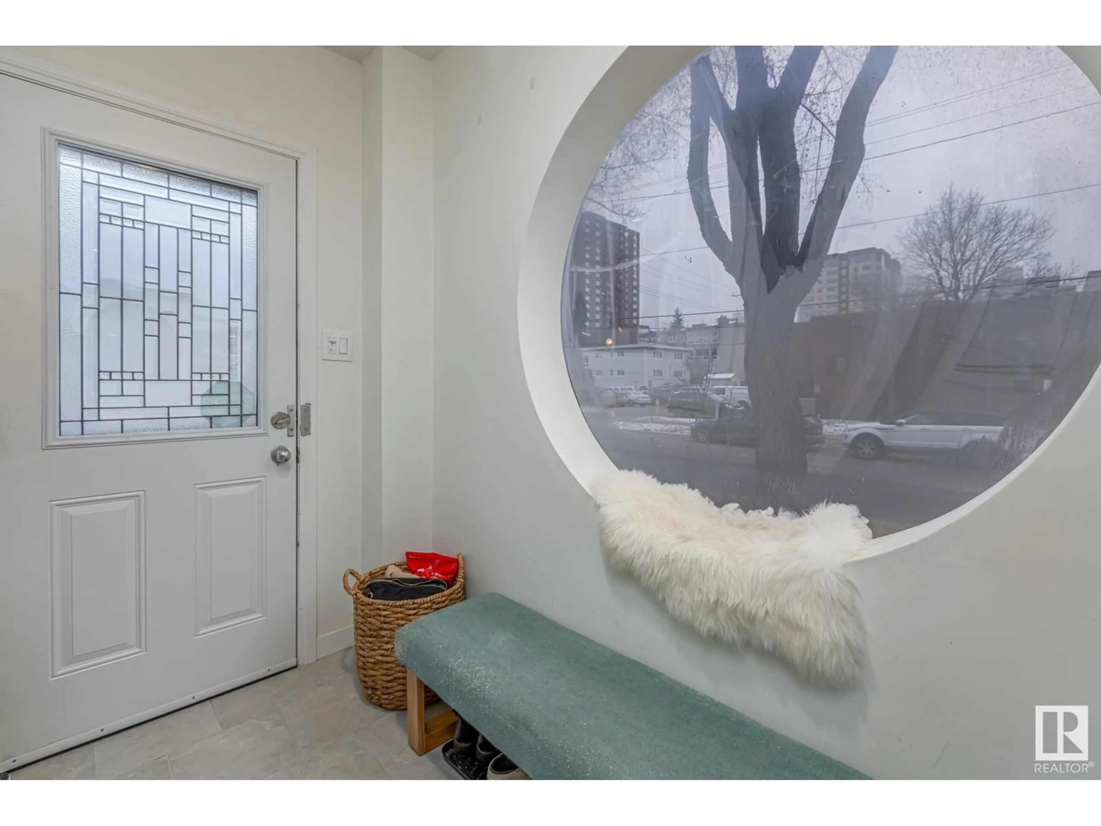 Indoor entryway, cement floor for 11922 102 AV NW, Edmonton Alberta T2G3B3