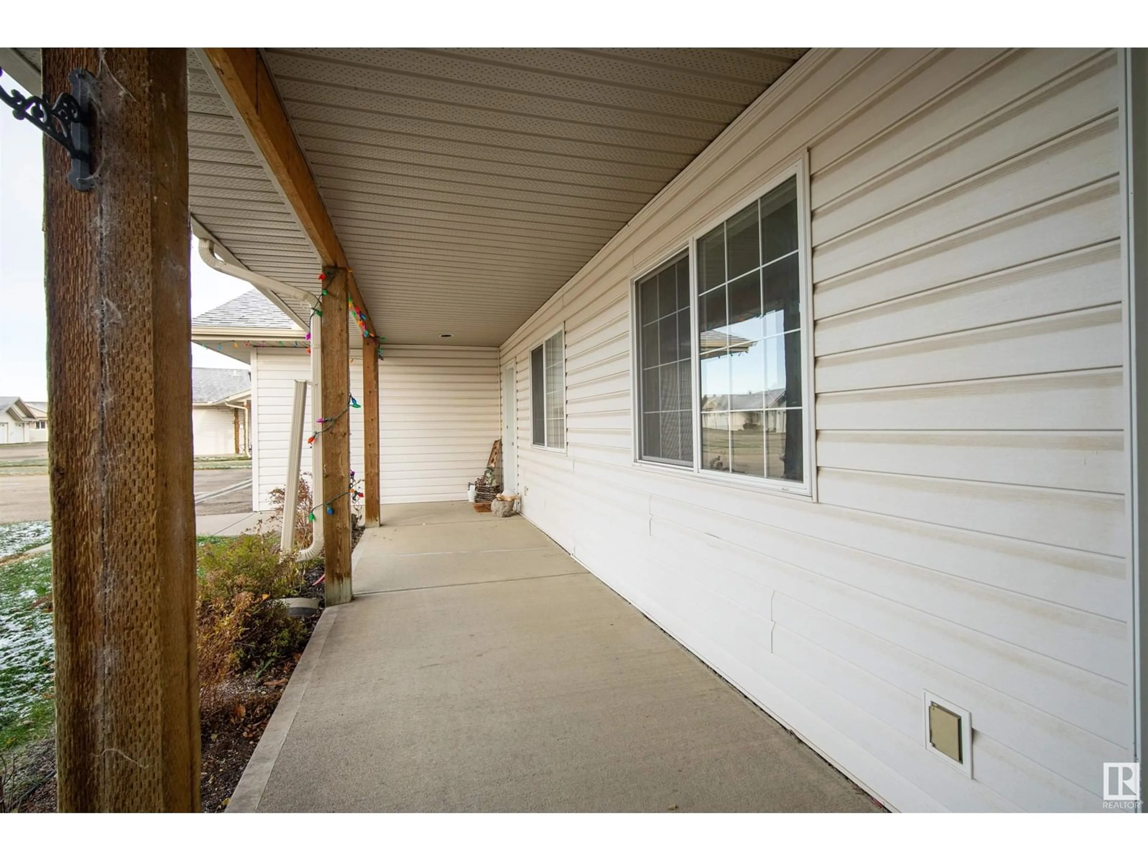 A pic from exterior of the house or condo, the street view for #12 4527 55 AV, Tofield Alberta T0B4J0