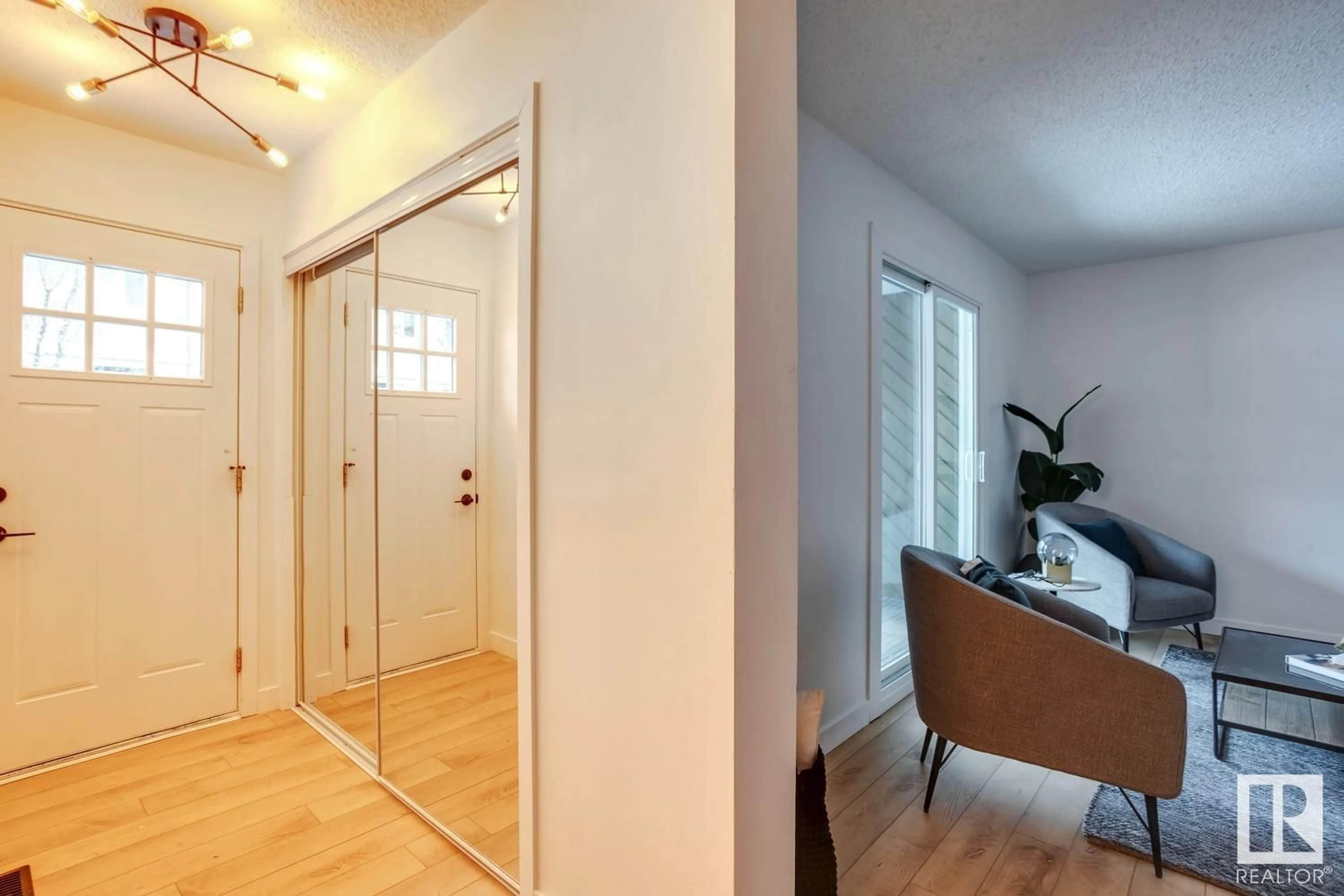 Indoor entryway, wood floors for 8033 27 AV NW, Edmonton Alberta T6K3C9