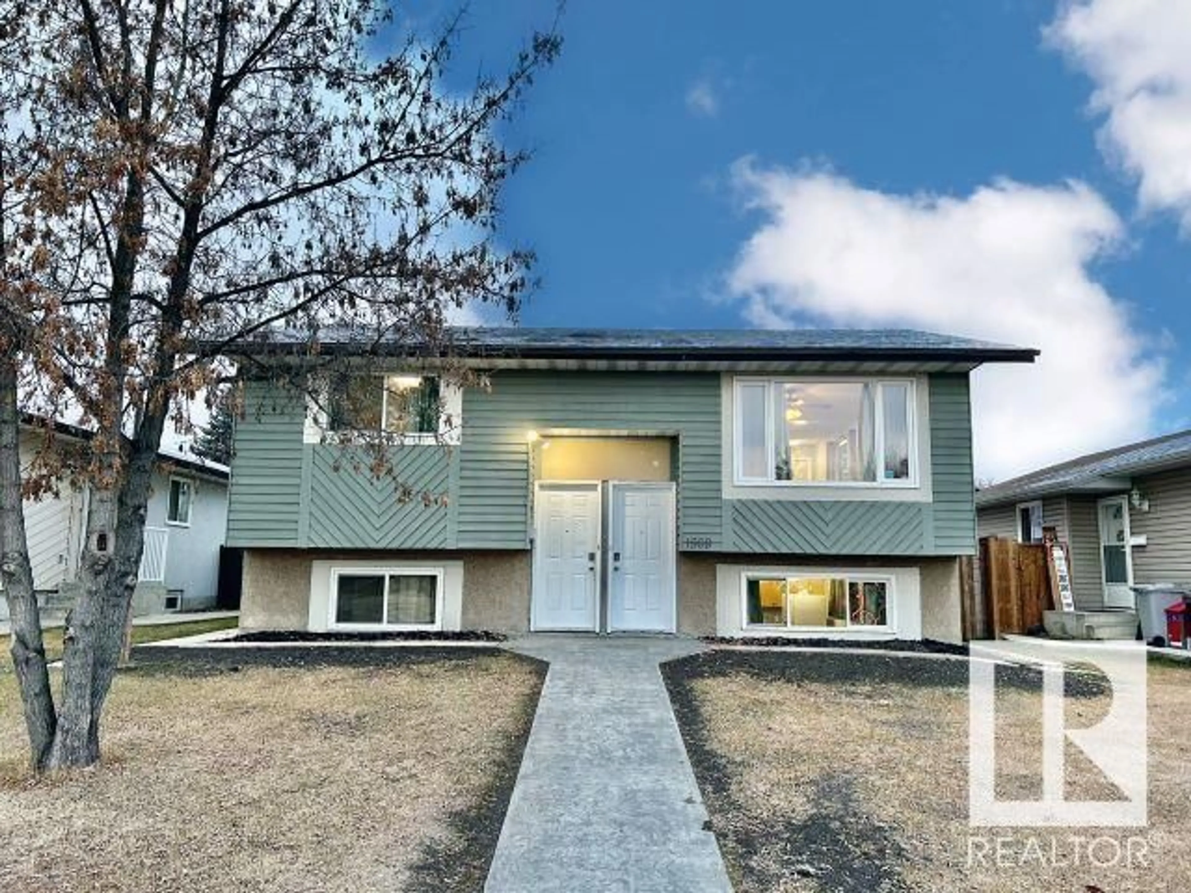 Frontside or backside of a home, the fenced backyard for 1569 LAKEWOOD W NW, Edmonton Alberta T6K2V7