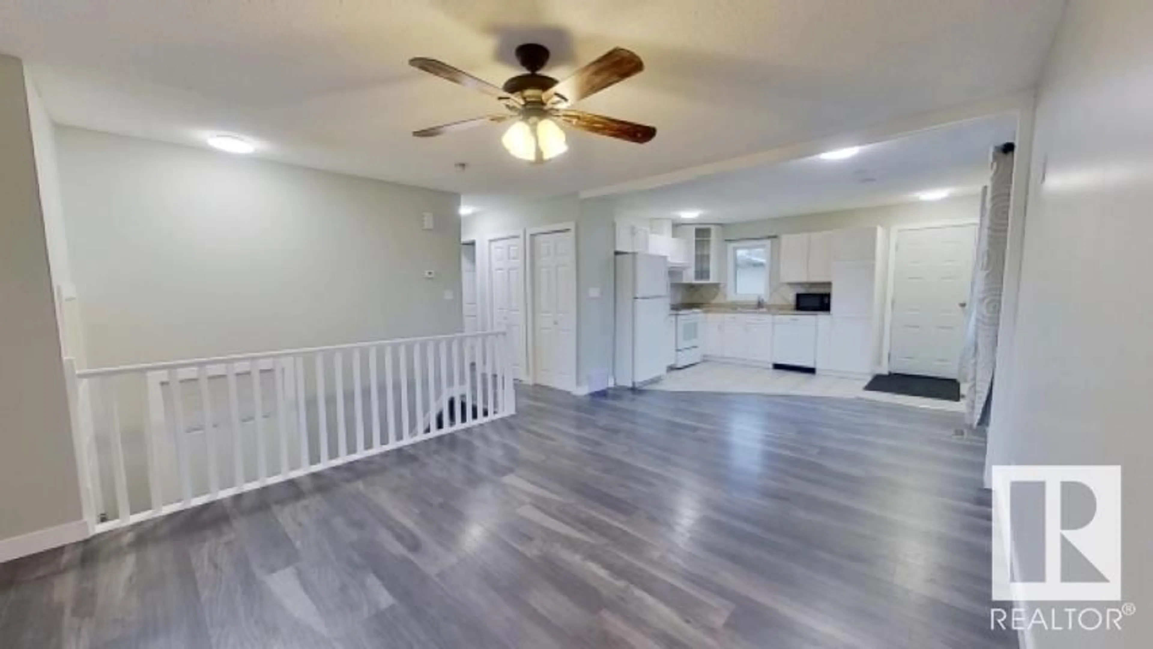 A pic of a room, wood floors for 1569 LAKEWOOD W NW, Edmonton Alberta T6K2V7