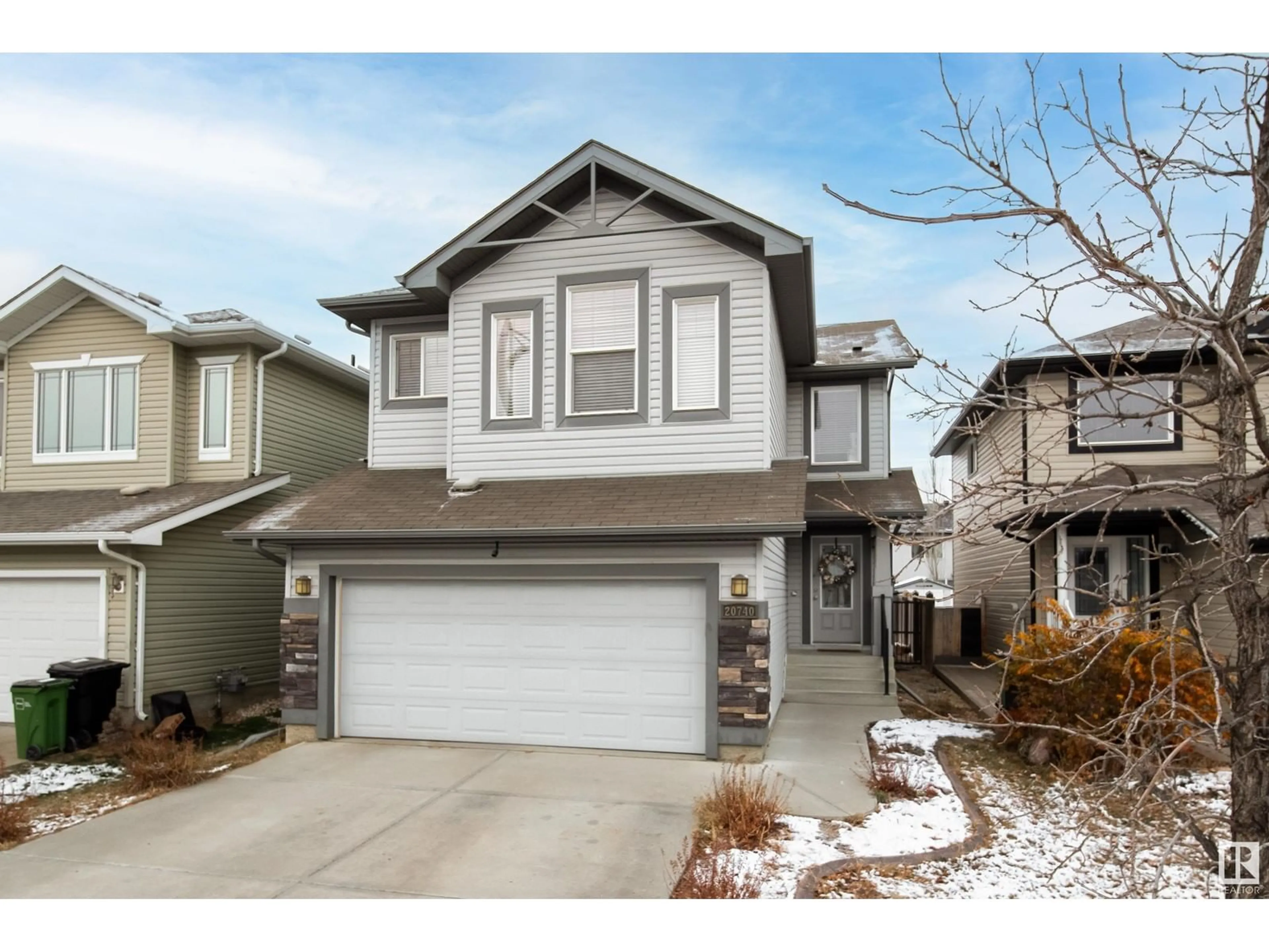 Frontside or backside of a home, the street view for 20740 96 AV NW, Edmonton Alberta T5T4M9