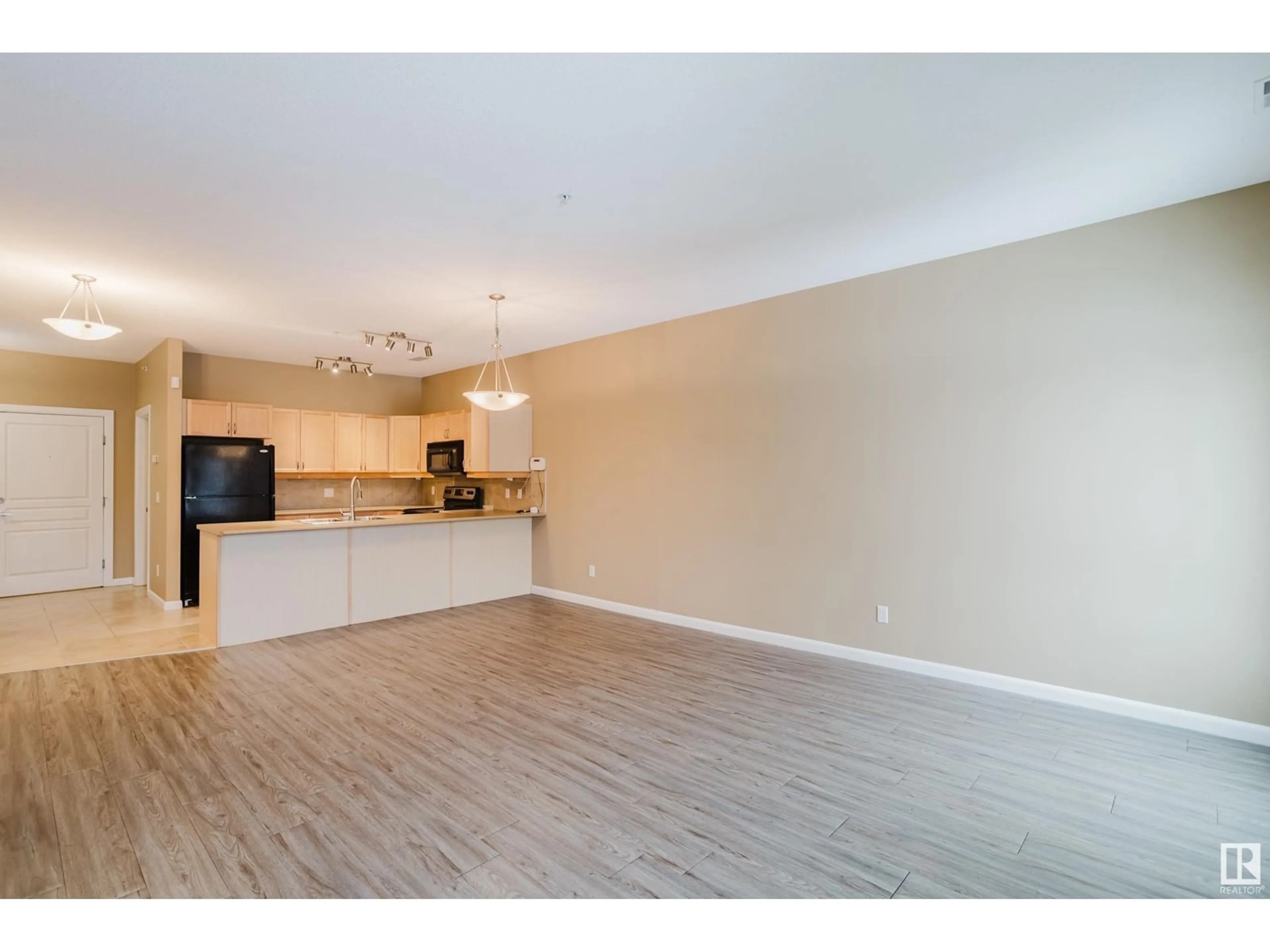 Open concept kitchen for #239 160 Magrath RD NW, Edmonton Alberta T6R3T7