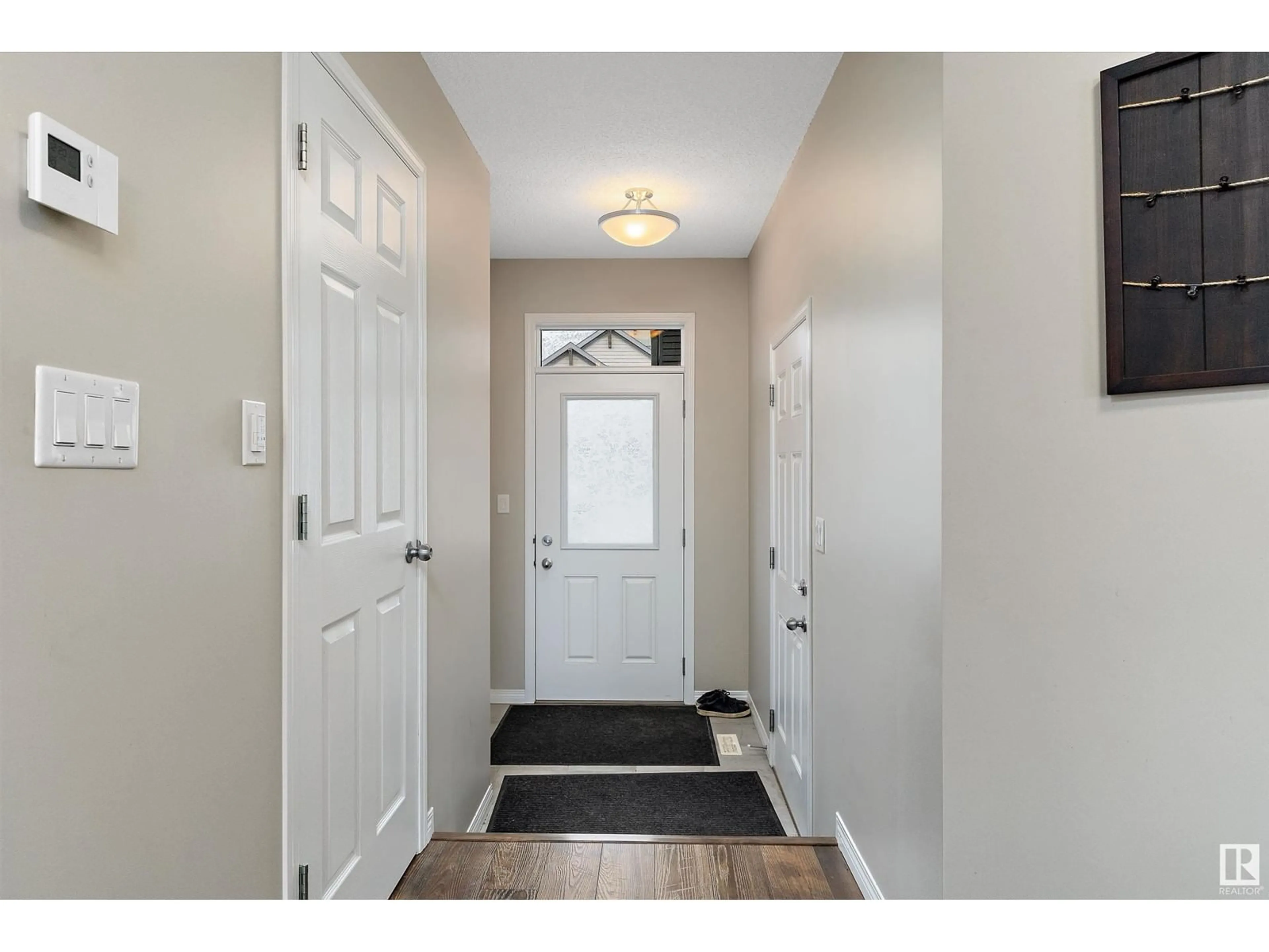 Indoor entryway, wood floors for 5229 CRABAPPLE LINK LI SW, Edmonton Alberta T6X2H6