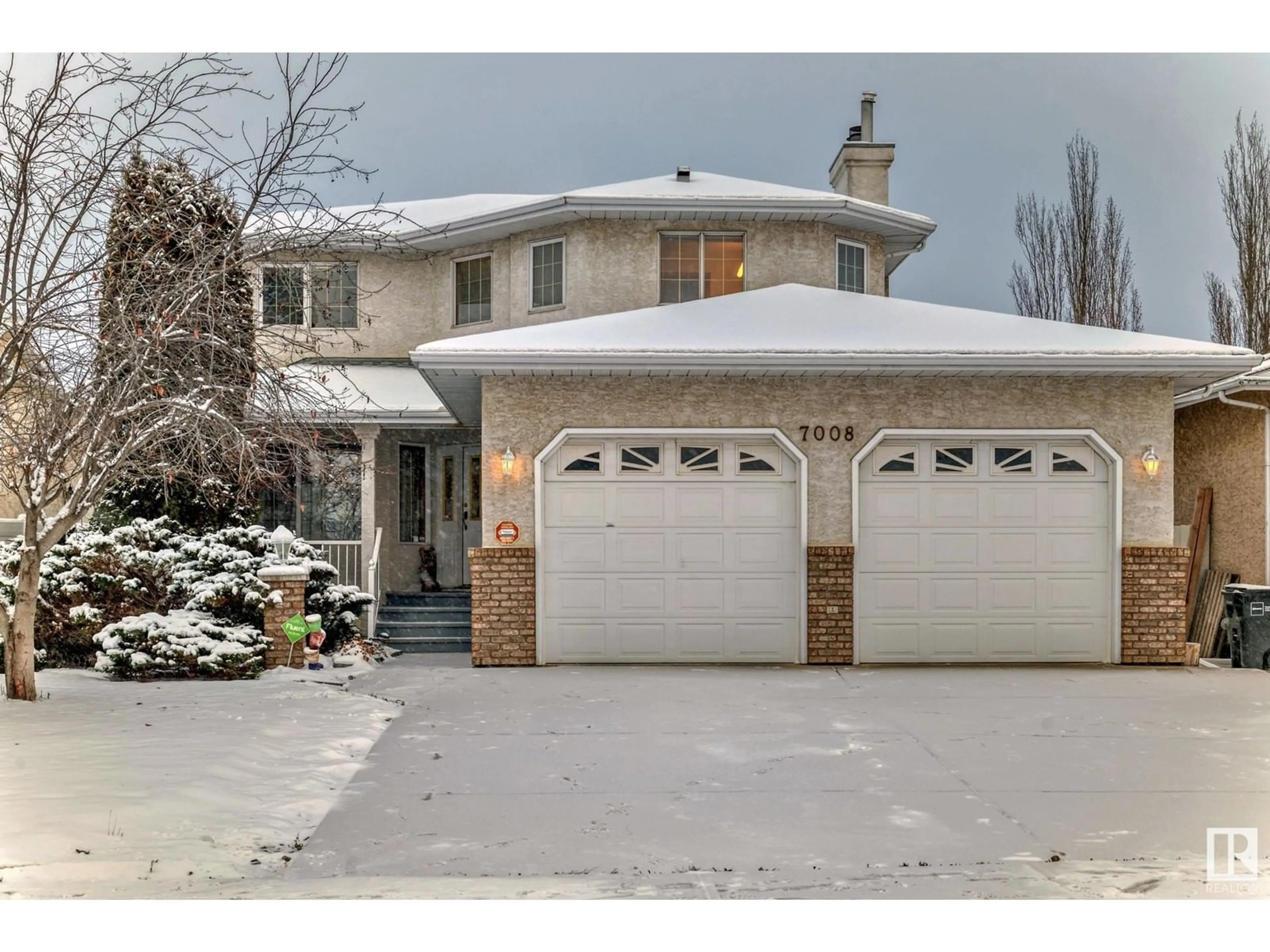 Frontside or backside of a home, the street view for 7008 157 AV NW, Edmonton Alberta T5Z2Z4