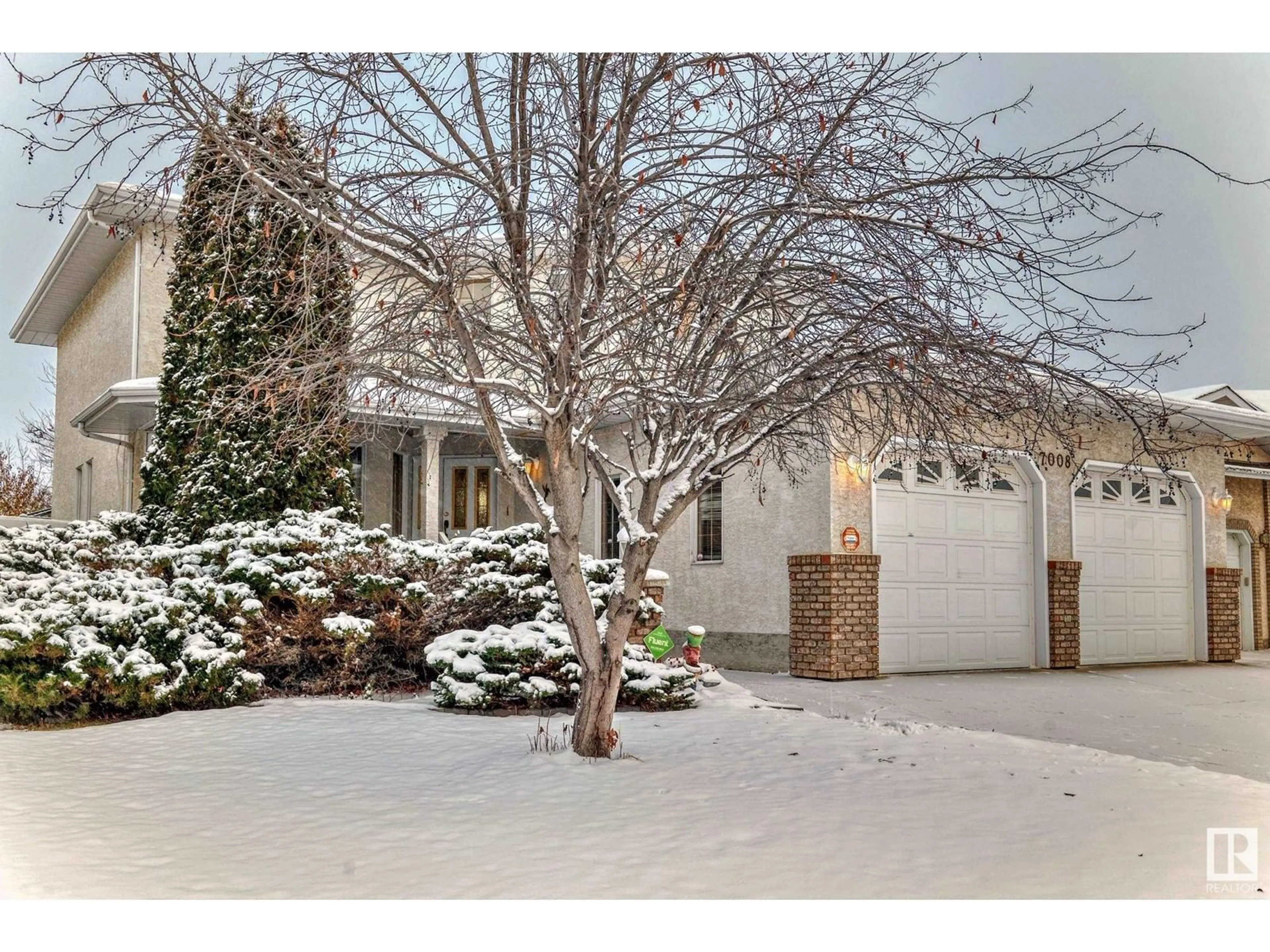 Frontside or backside of a home, the street view for 7008 157 AV NW, Edmonton Alberta T5Z2Z4