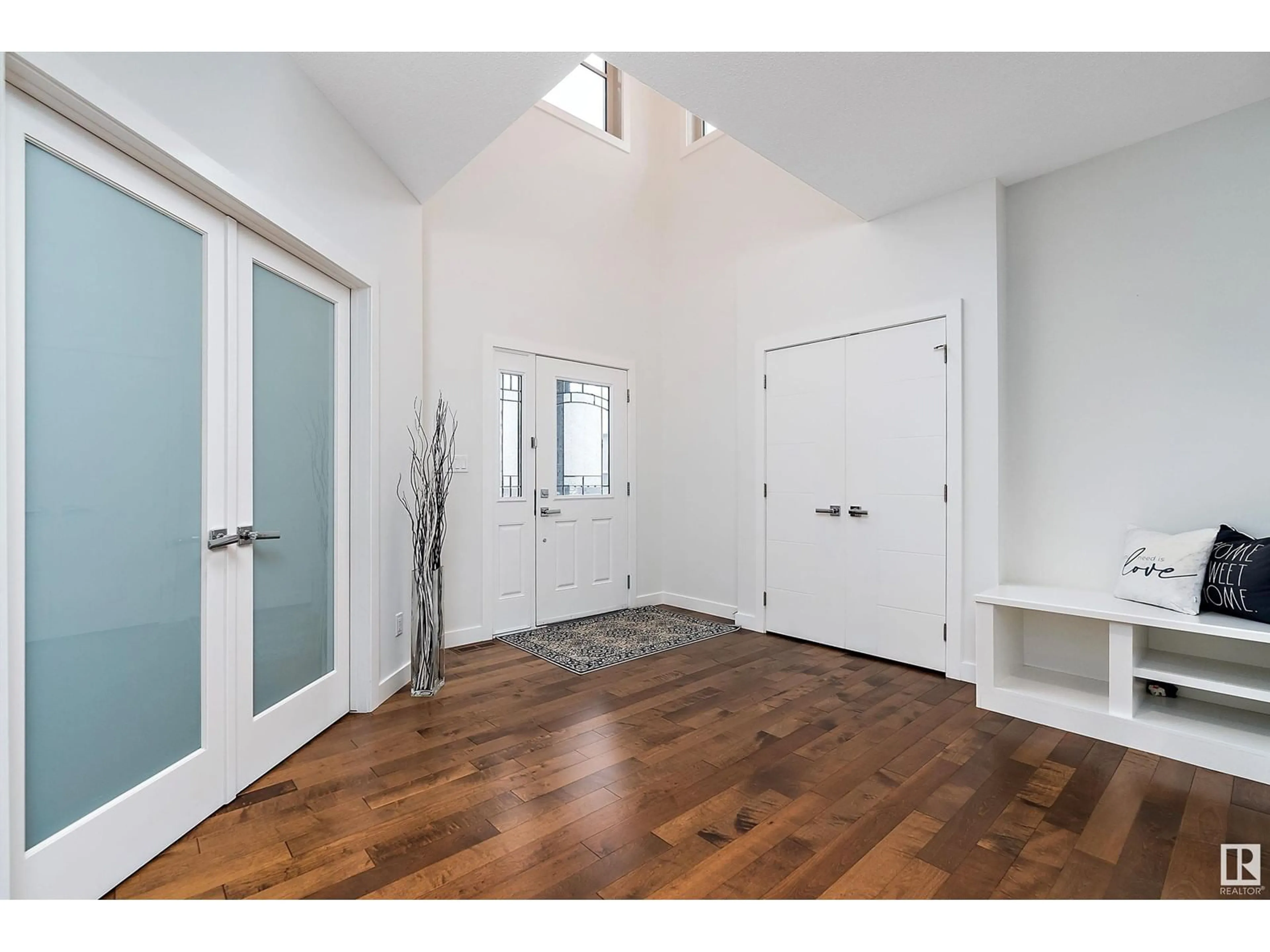 Indoor entryway, wood floors for 17347 11 AV SW, Edmonton Alberta T6W1Z6