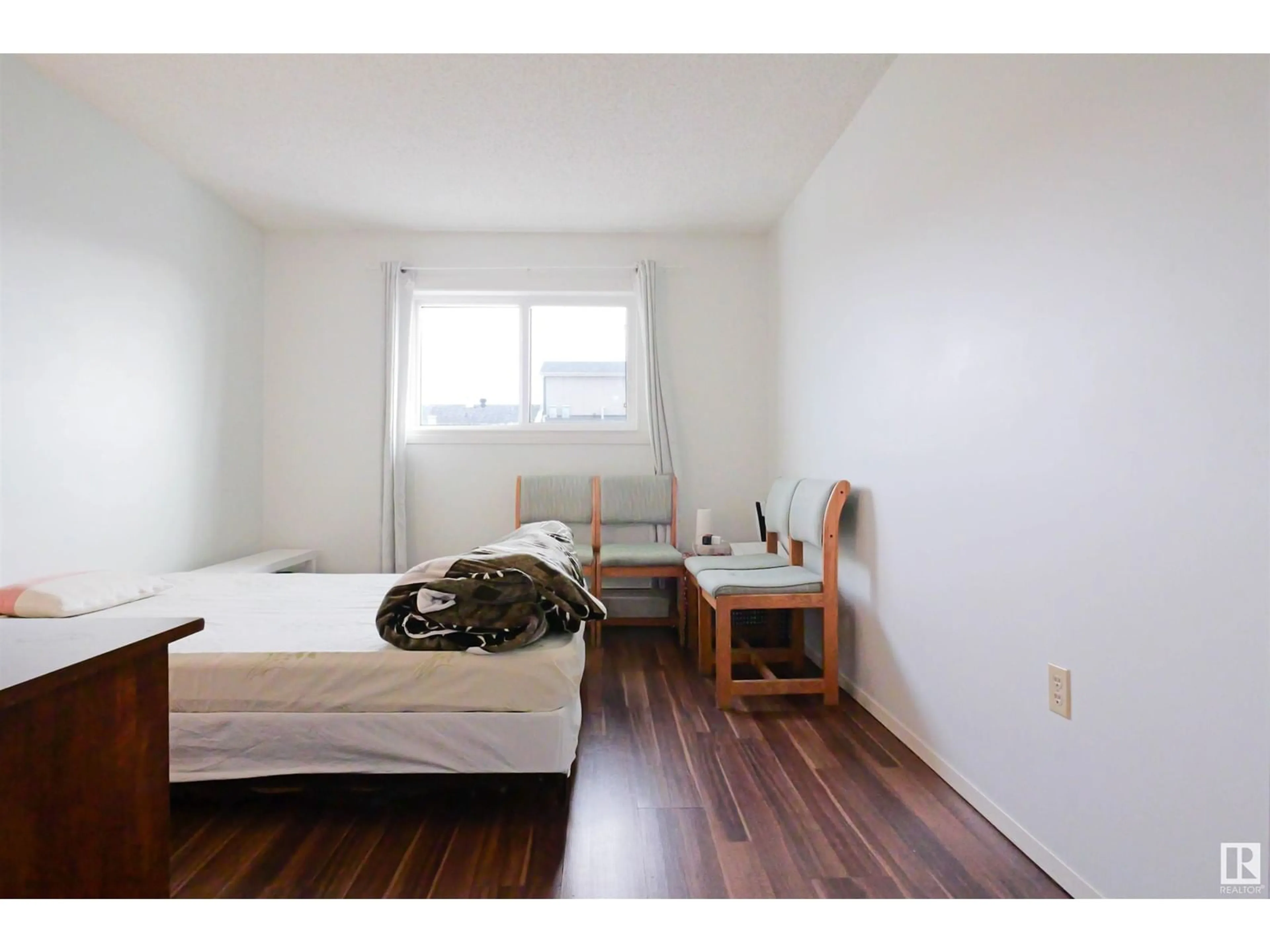 A pic of a room, wood floors for #401 1624 48 ST NW, Edmonton Alberta T6L5P1