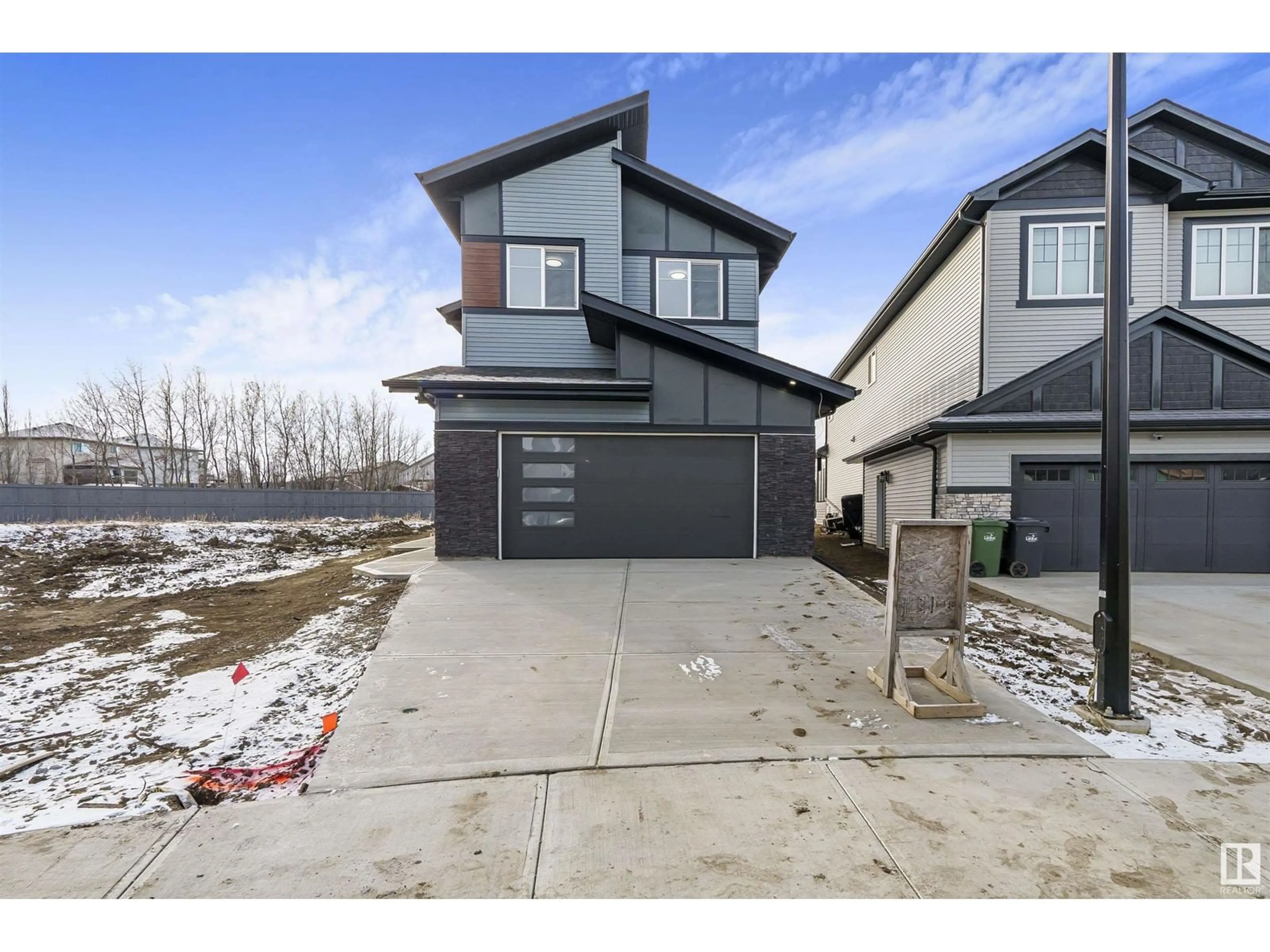 Frontside or backside of a home, the street view for 214 Kettyl Court, Leduc Alberta T9E1S1