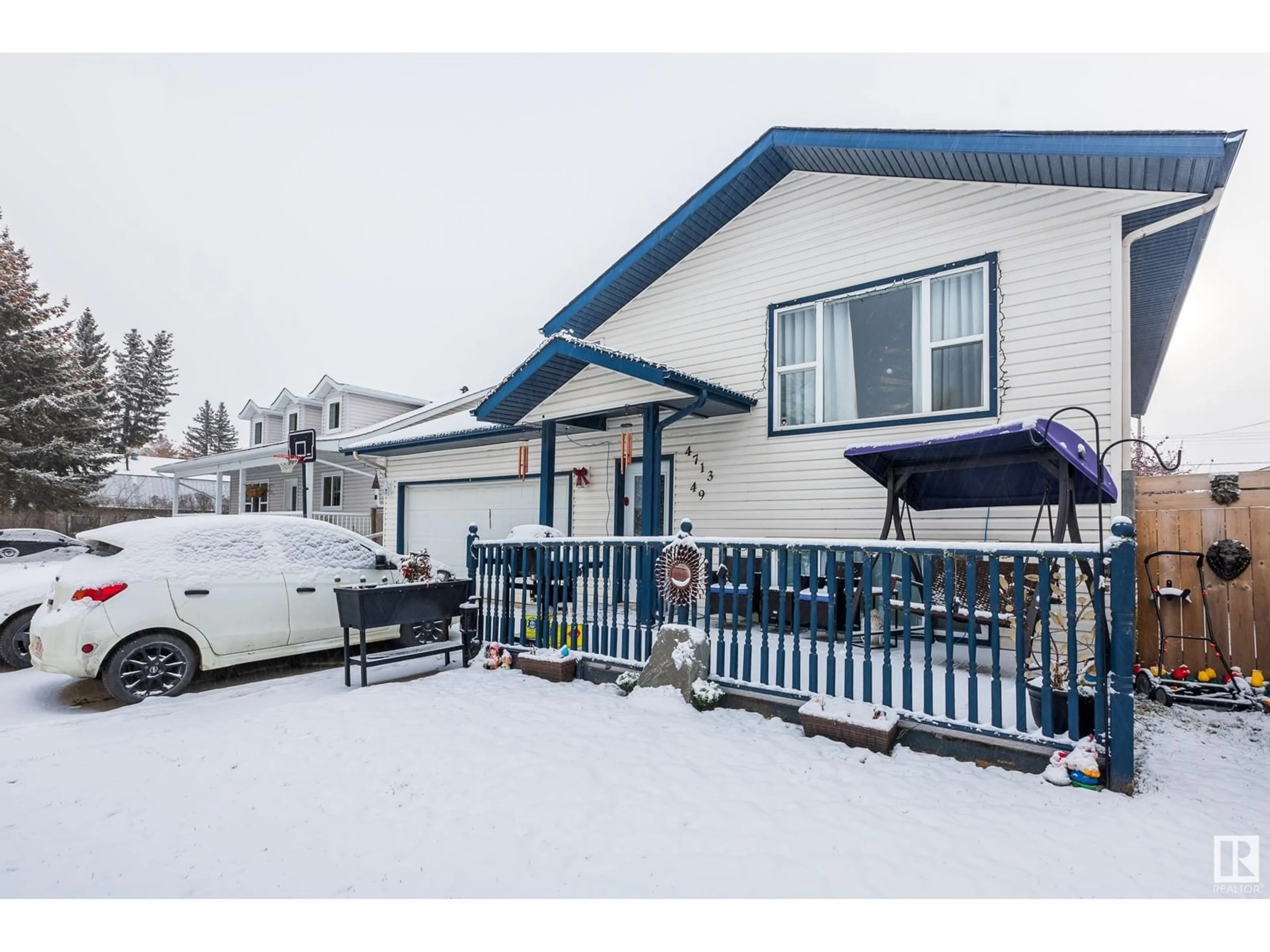 A pic from exterior of the house or condo, the fenced backyard for 4713 49 AV, Legal Alberta T0G1L0