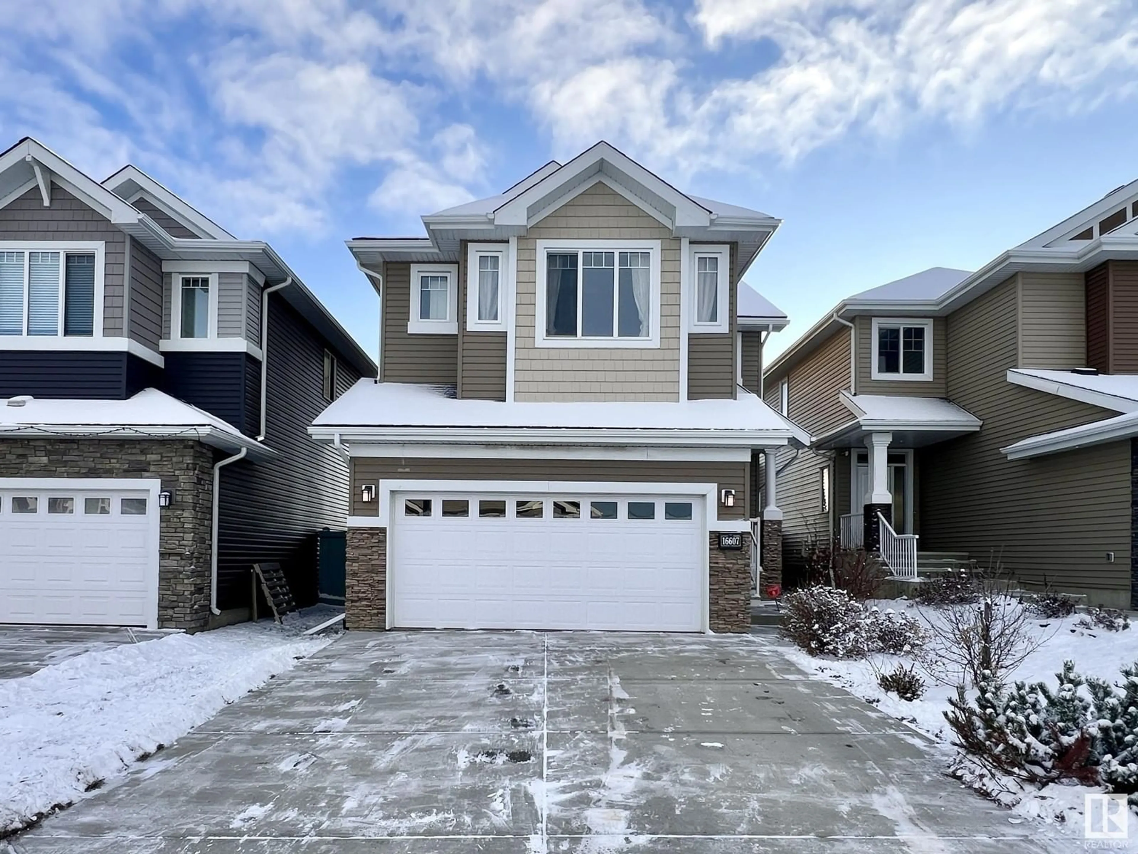 Frontside or backside of a home, the street view for 16607 18 AV SW, Edmonton Alberta T6W3C5