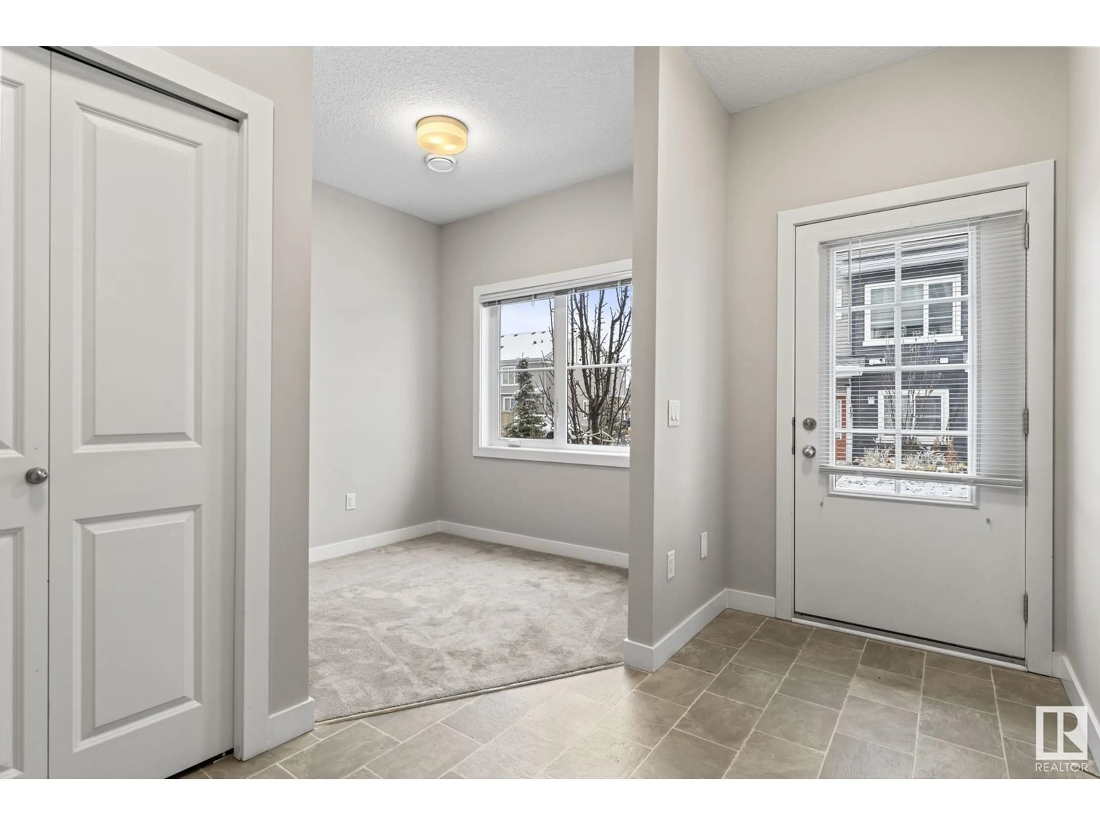 Indoor entryway, carpet floors for #9 1636 KERR RD NW, Edmonton Alberta T5E6W3