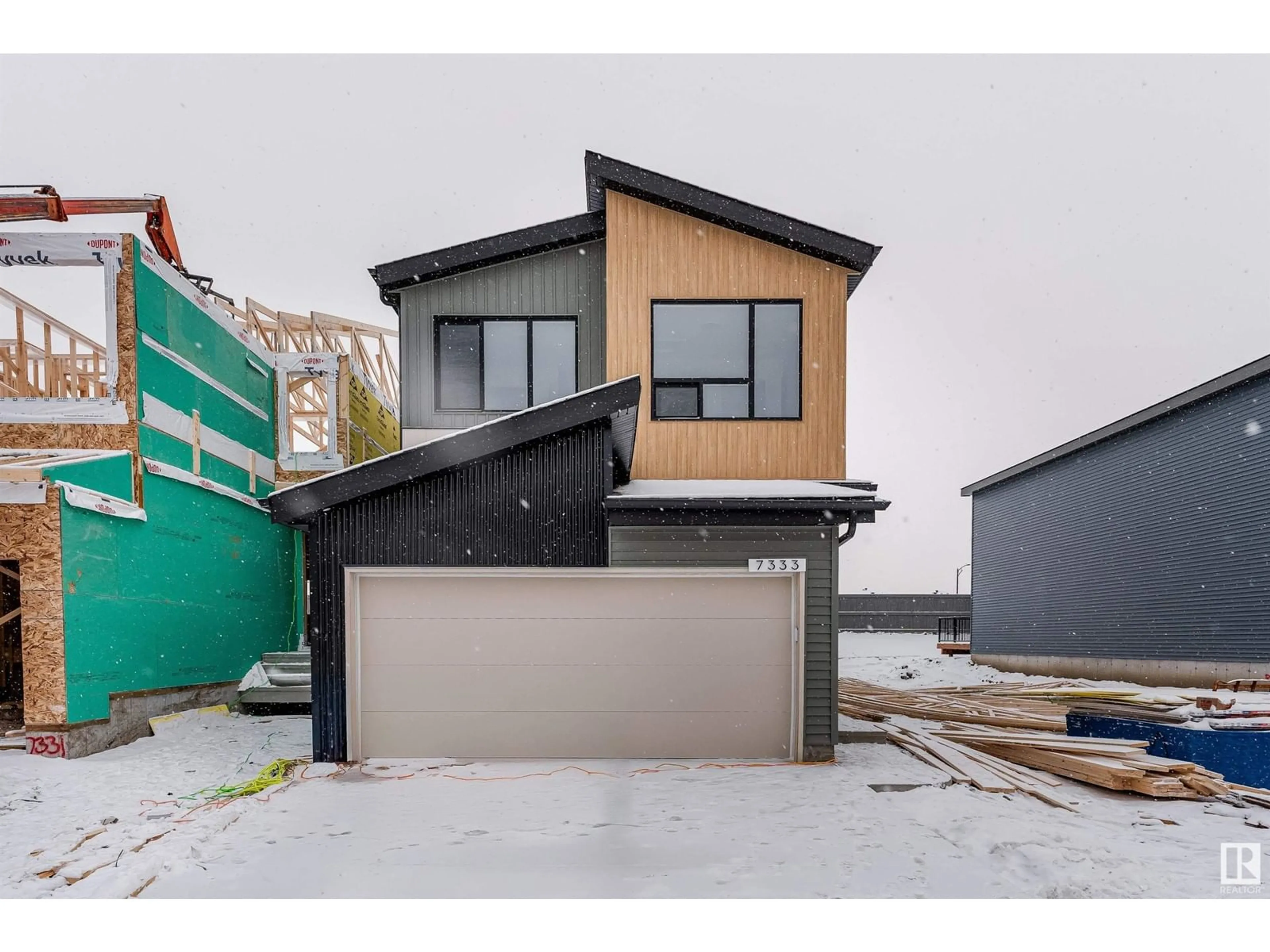 Frontside or backside of a home, the street view for 7333 Klapstein CR SW, Edmonton Alberta T6W5N5