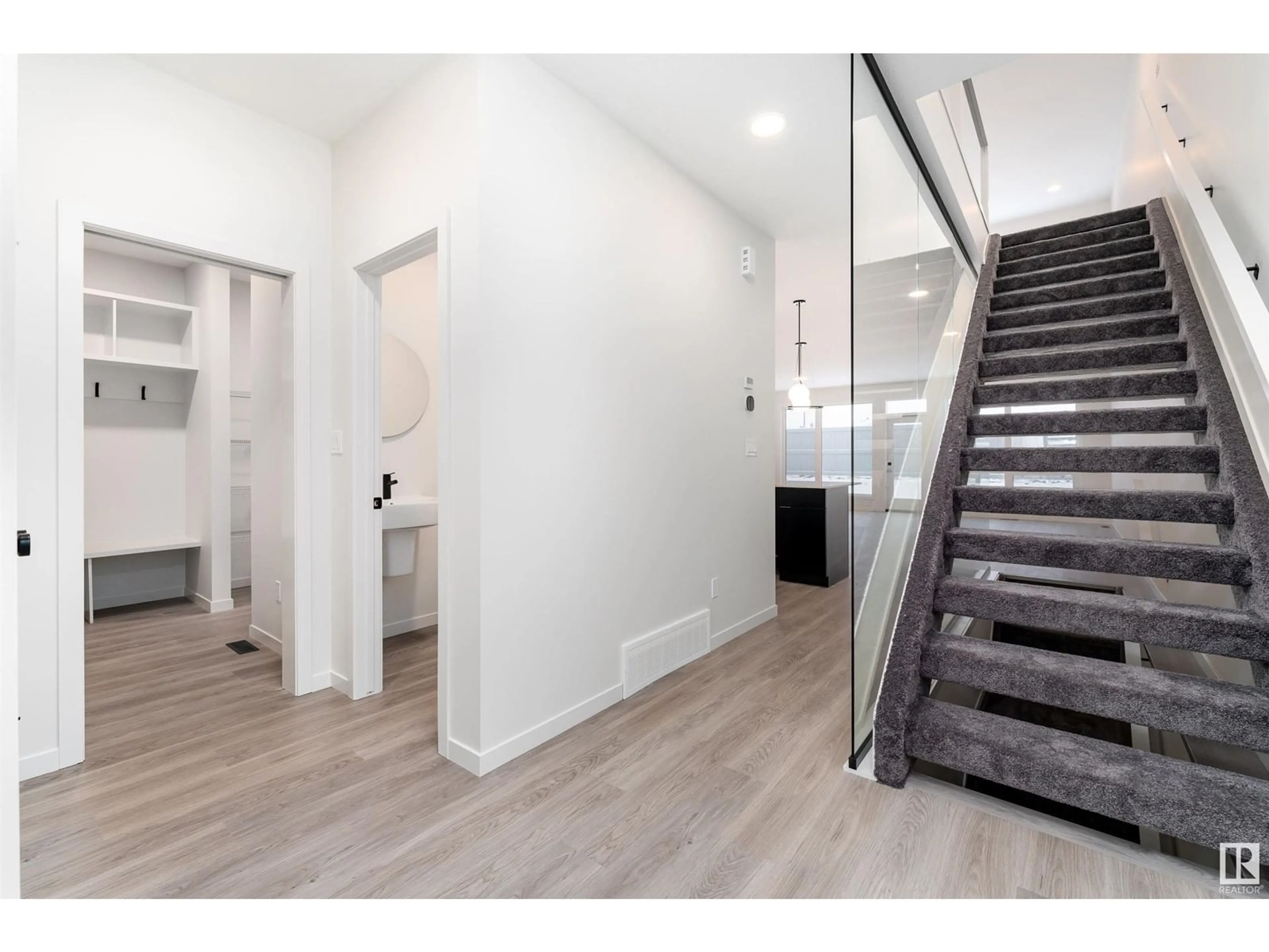 Indoor entryway, wood floors for 7333 Klapstein CR SW, Edmonton Alberta T6W5N5