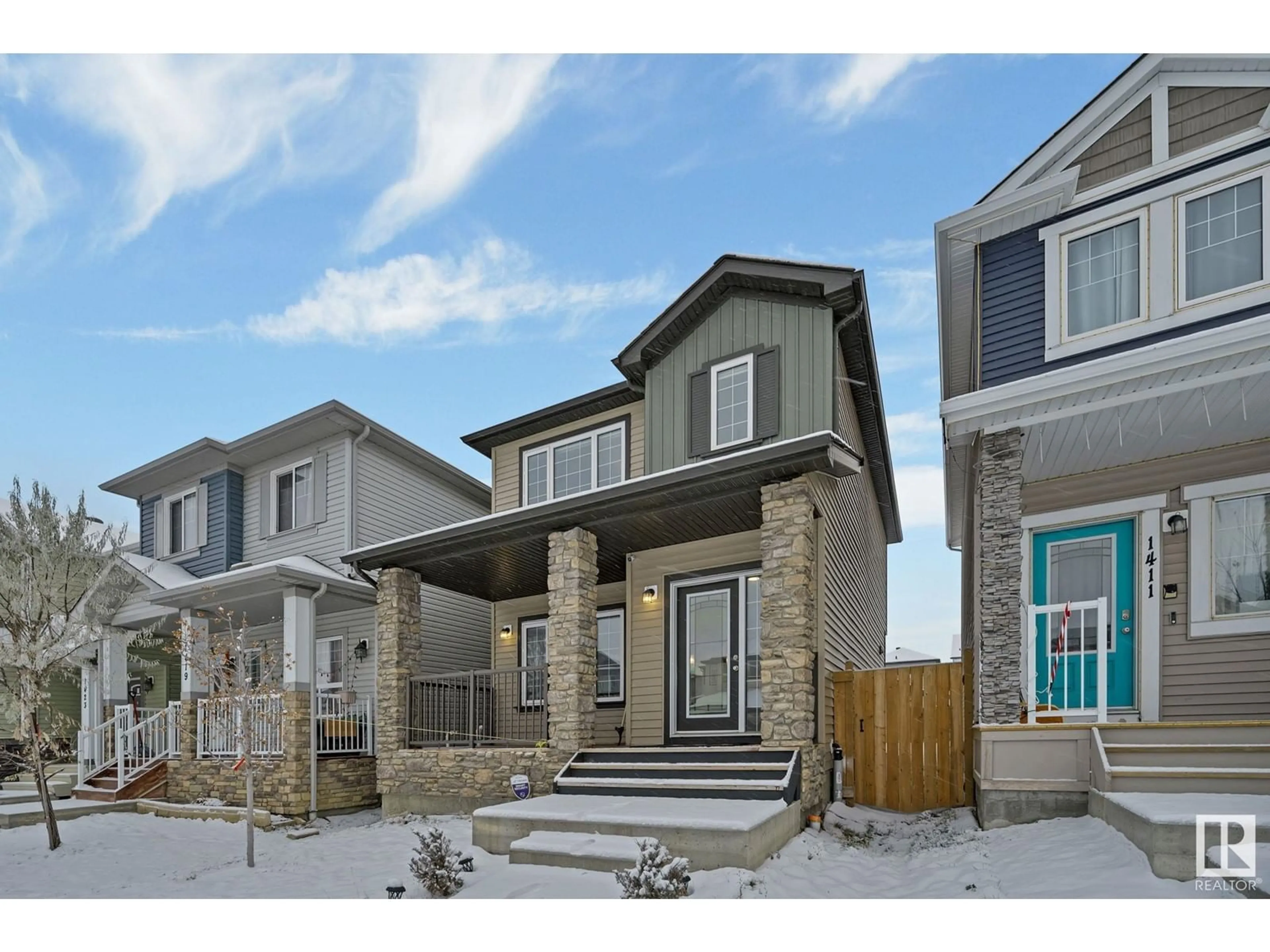 A pic from exterior of the house or condo, the fenced backyard for 1415 24st NW NW NW, Edmonton Alberta T6T2J7