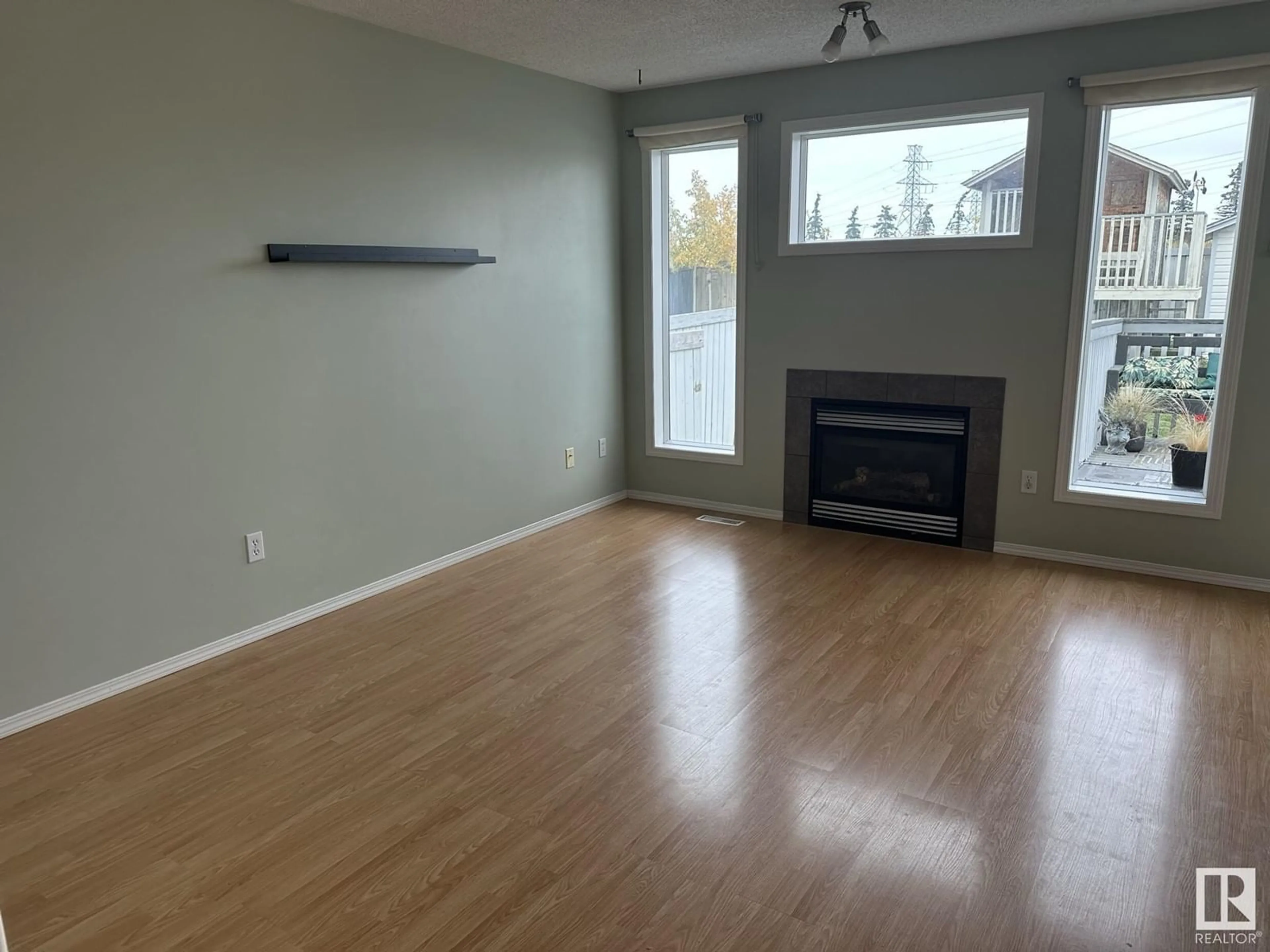 A pic of a room, wood floors for 7932 2 AV SW, Edmonton Alberta T6X1K7