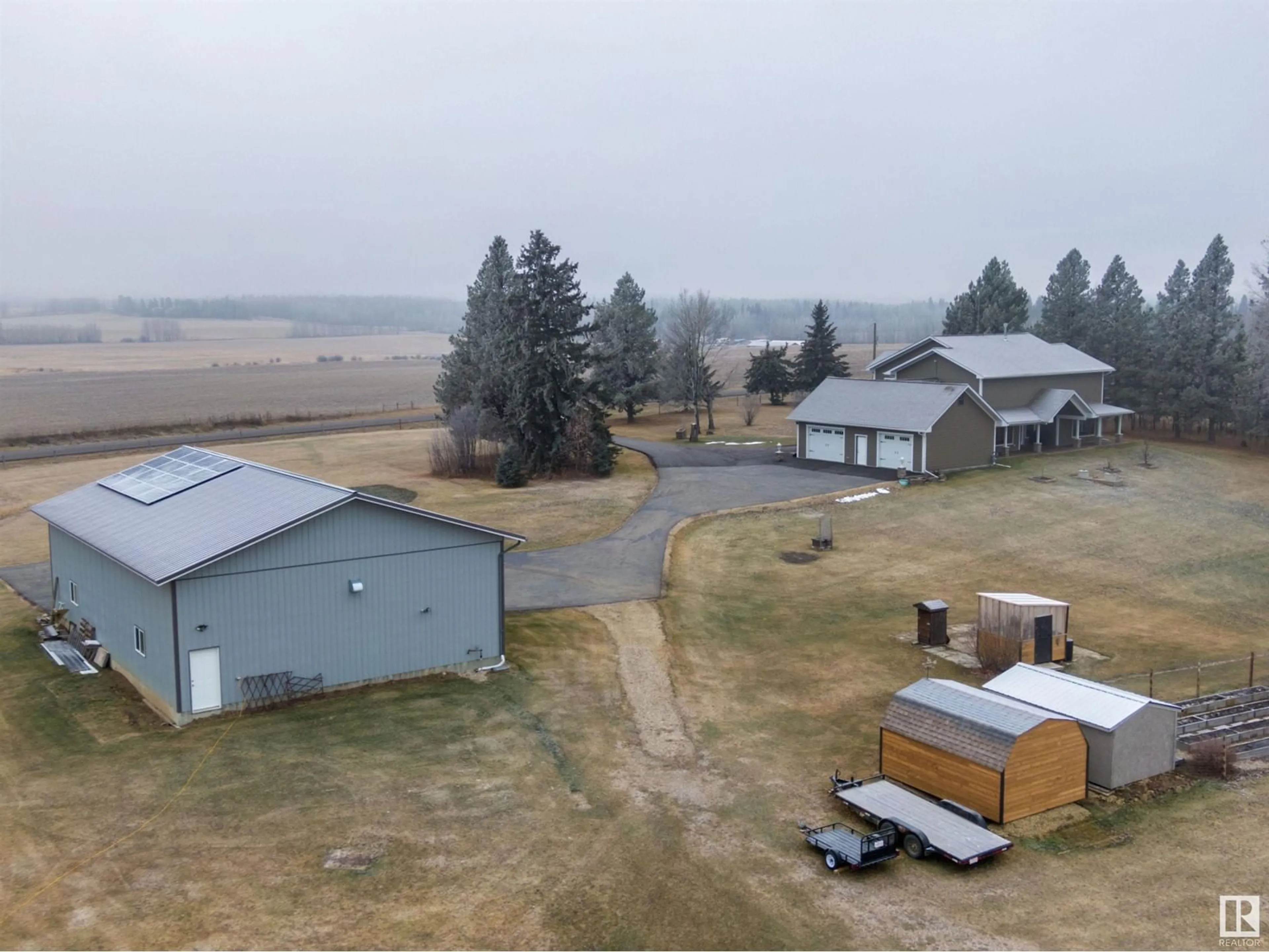 A pic from outside/outdoor area/front of a property/back of a property/a pic from drone, unknown for 7126 TOWNSHIP ROAD 514, Rural Parkland County Alberta T0E0S0