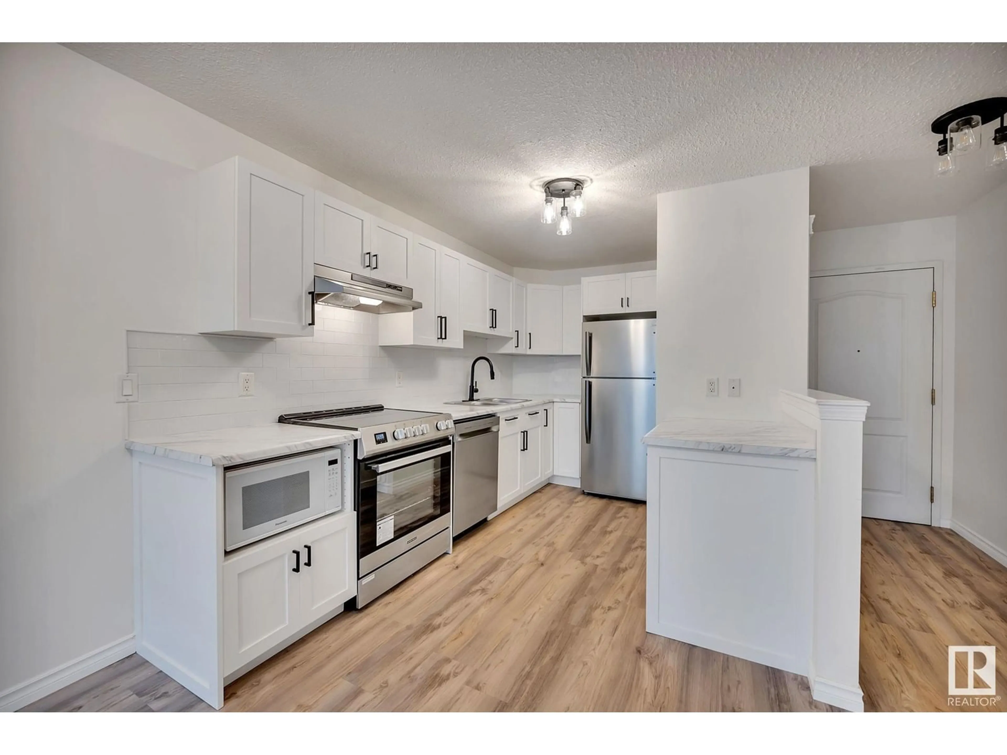 Standard kitchen, wood floors for #423 2741 55 ST NW, Edmonton Alberta T6L7G7