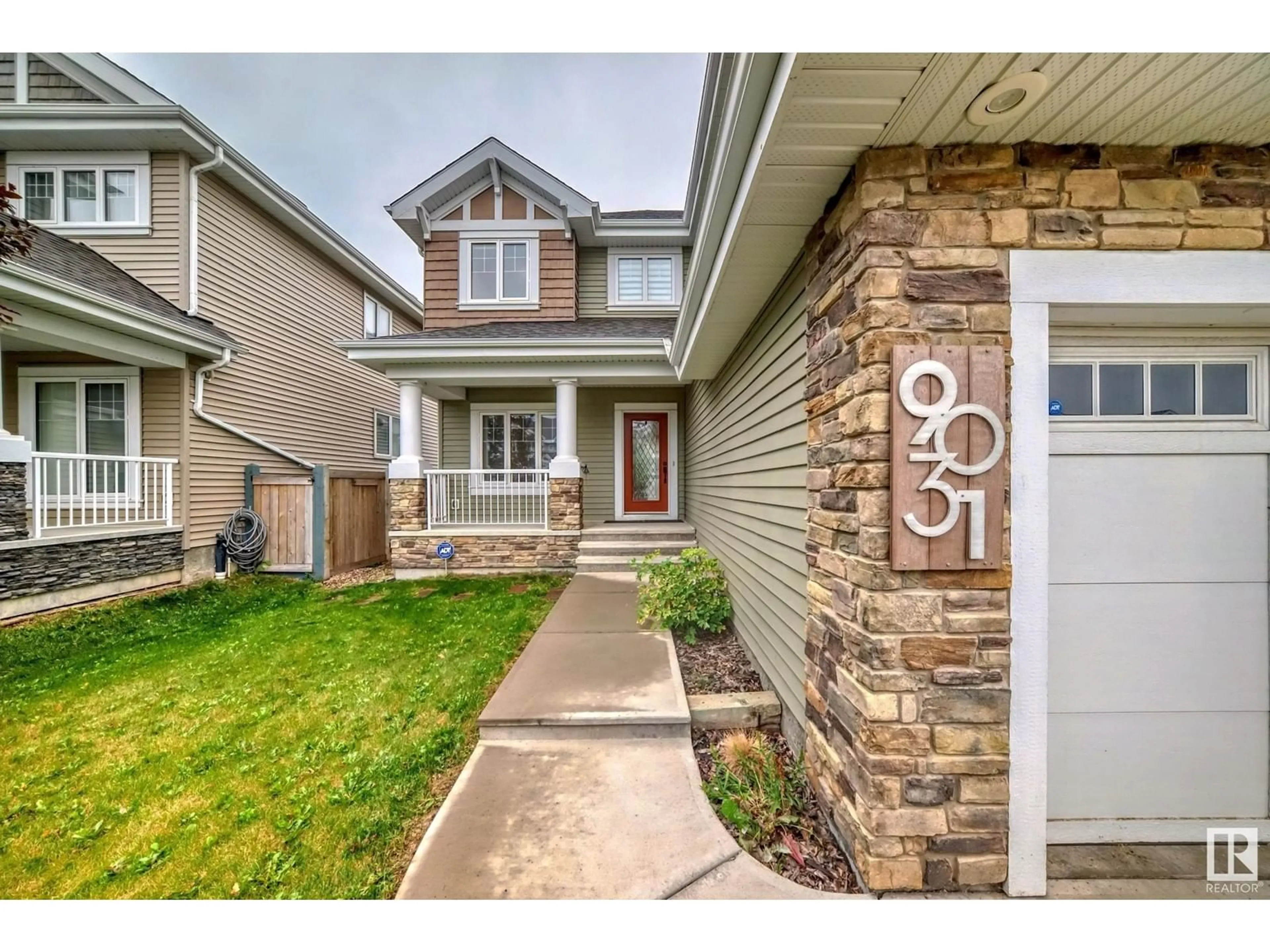 Frontside or backside of a home, the street view for 9031 24 AV SW, Edmonton Alberta T6X1A6