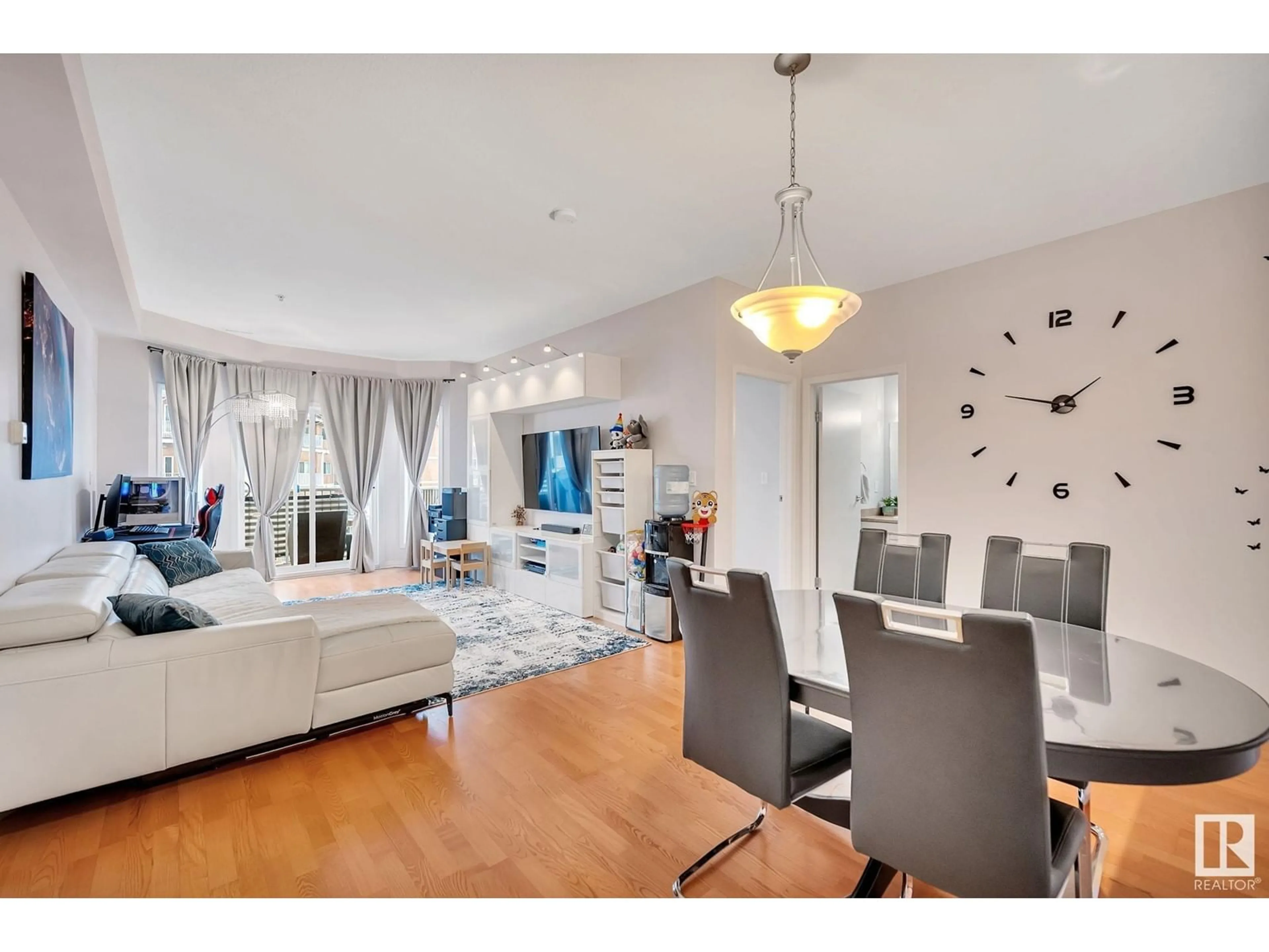 Dining room, wood floors for #304 4304 139 AV NW, Edmonton Alberta T5Y0H6