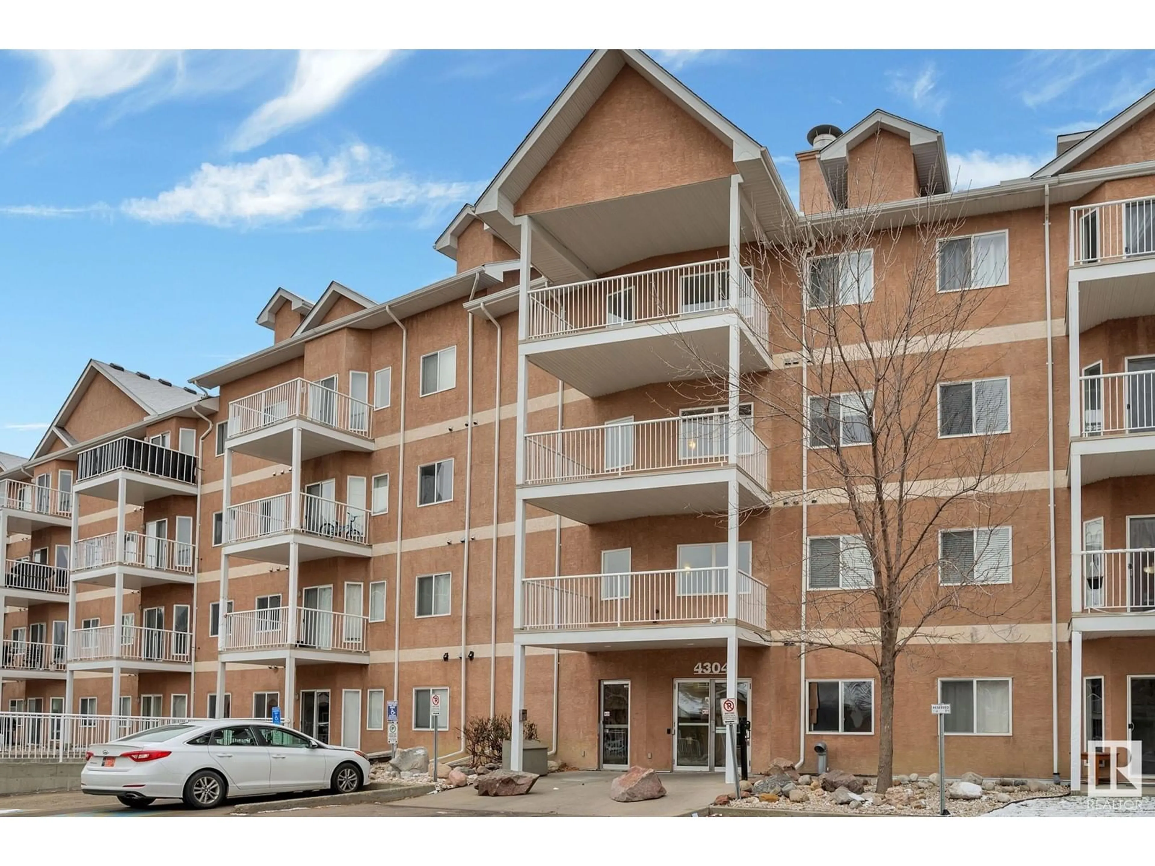 A pic from exterior of the house or condo, the front or back of building for #304 4304 139 AV NW, Edmonton Alberta T5Y0H6