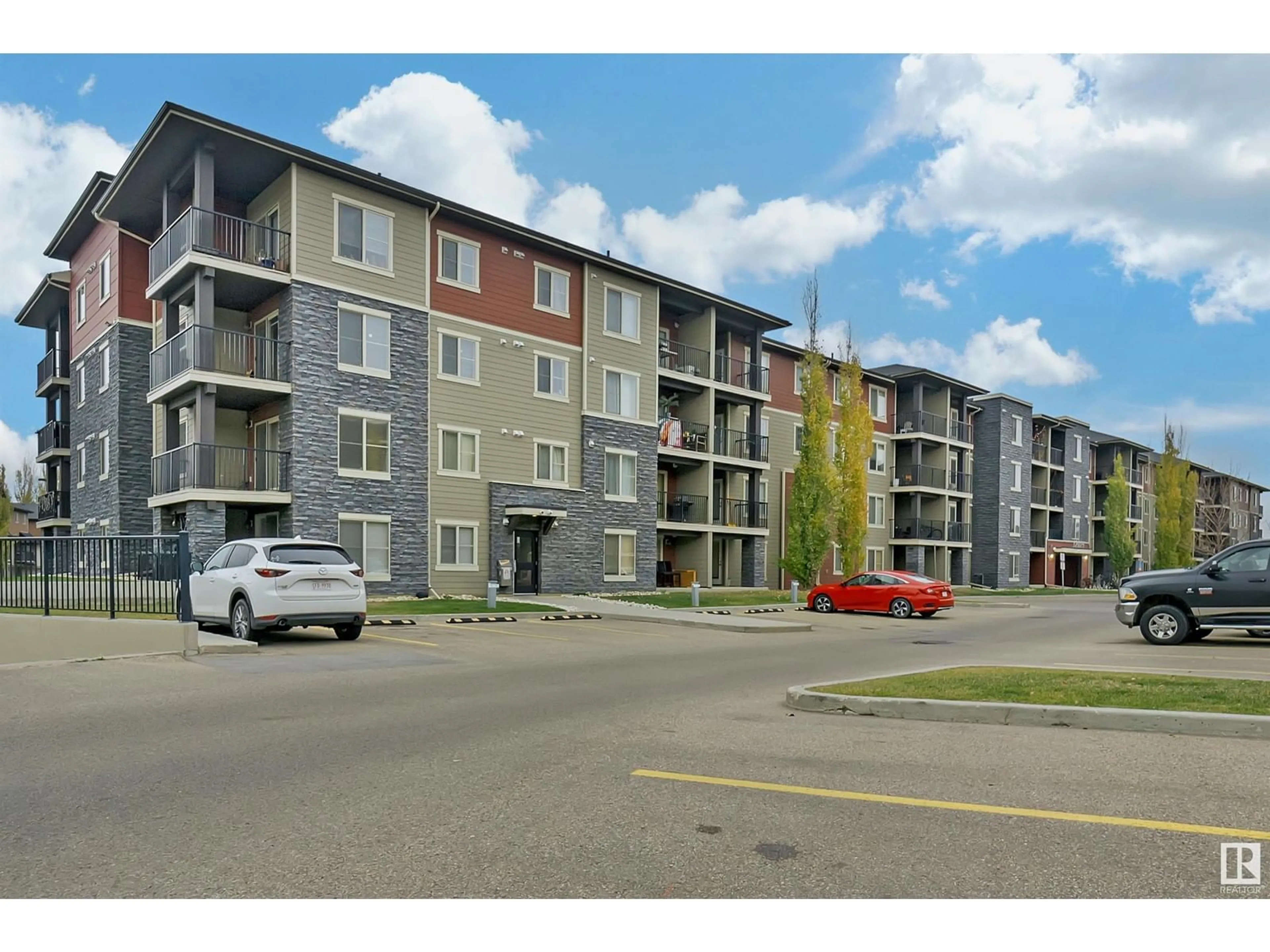 A pic from exterior of the house or condo, the street view for #119 12025 22 AV SW, Edmonton Alberta T6W2Y1