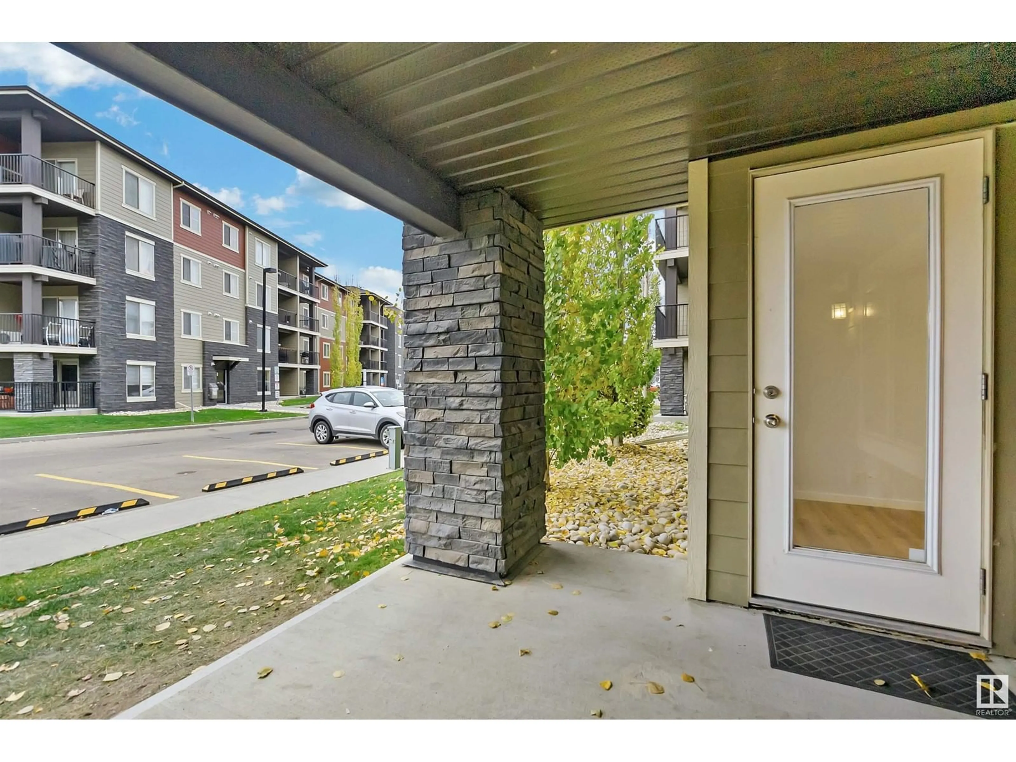 A pic from exterior of the house or condo, the street view for #119 12025 22 AV SW, Edmonton Alberta T6W2Y1