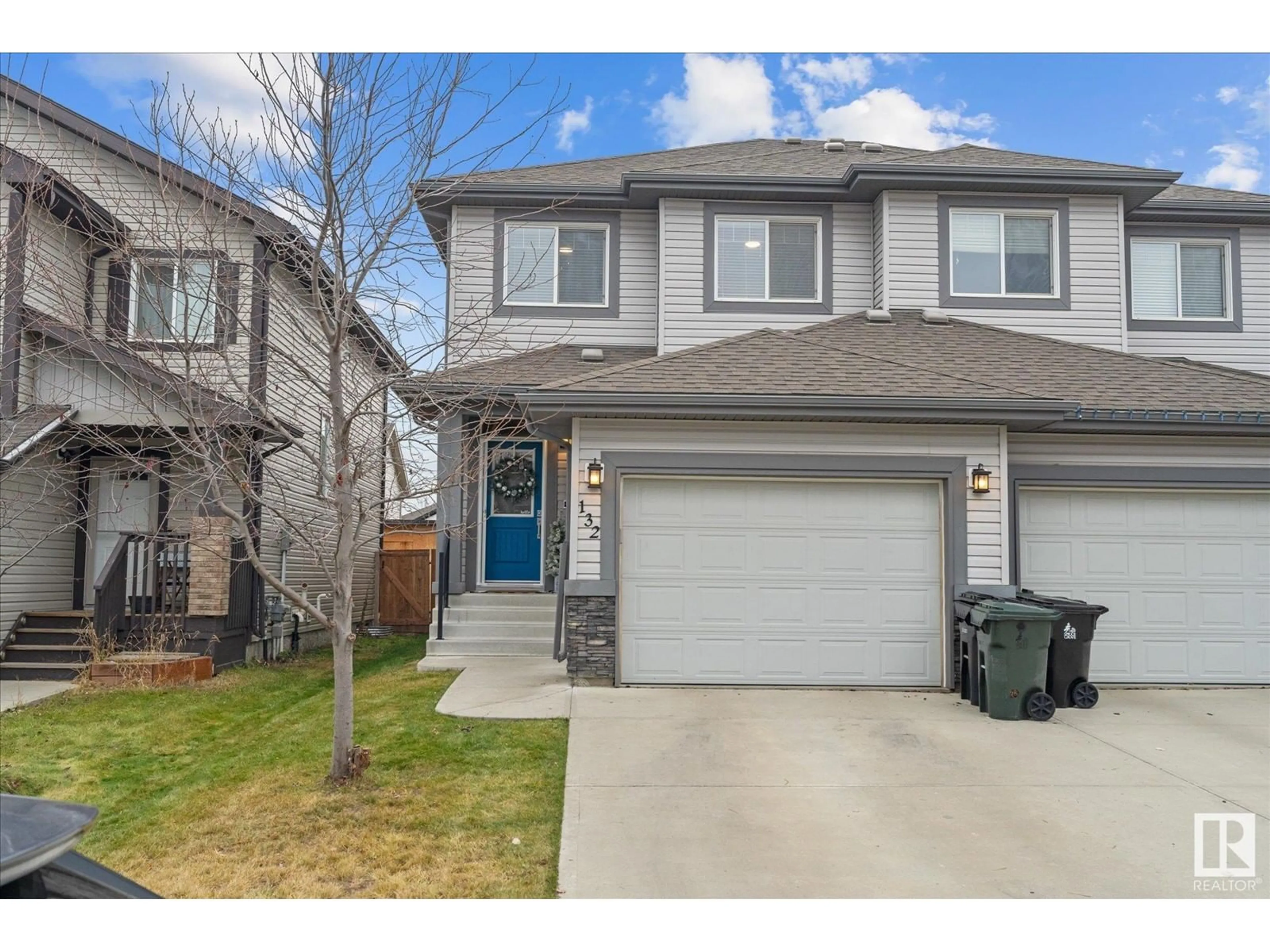 Frontside or backside of a home, the fenced backyard for 132 SPRINGWOOD WY, Spruce Grove Alberta T7X0S7