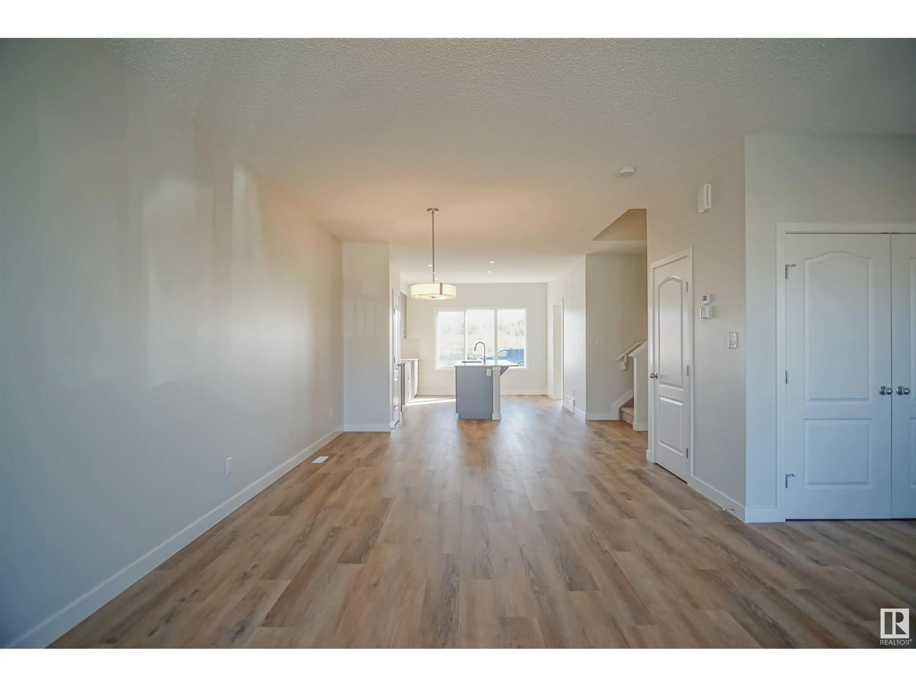 A pic of a room, wood floors for 21240 131 AV NW, Edmonton Alberta T5S0R8