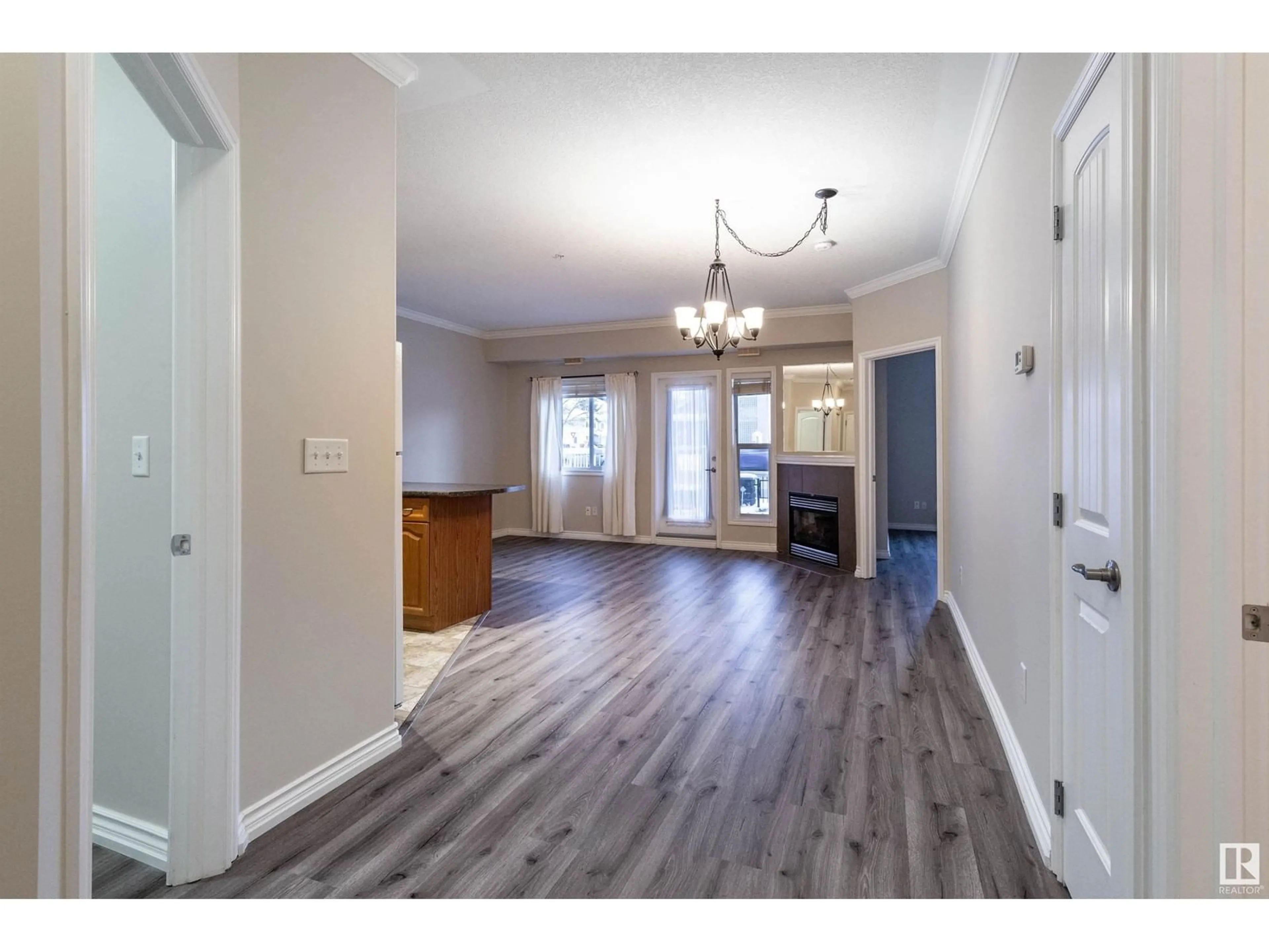 Indoor entryway, wood floors for #122 8528 82 AV NW, Edmonton Alberta T6C0Y8