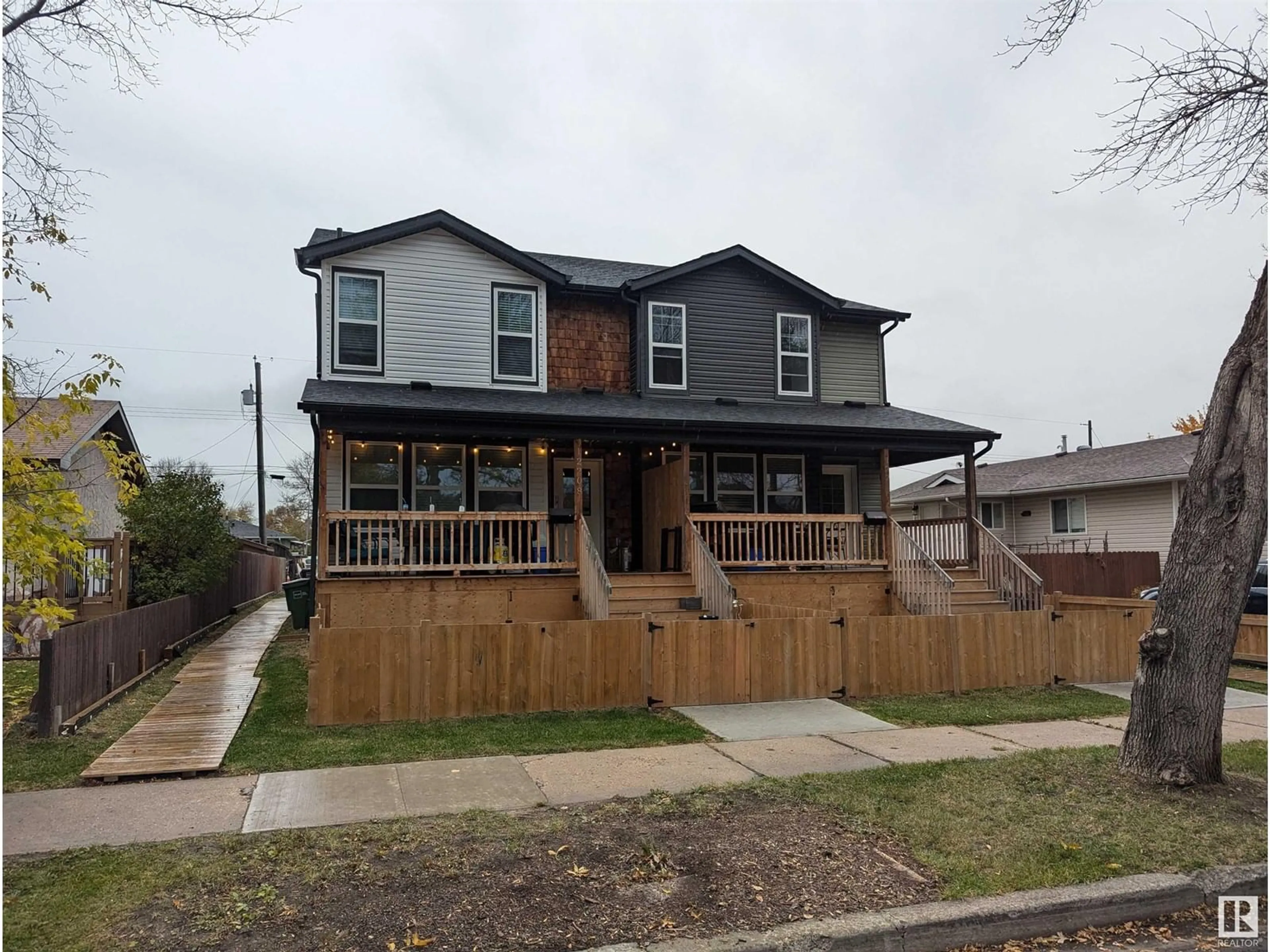 Frontside or backside of a home, the front or back of building for 12208 41 ST NW, Edmonton Alberta T5W2M8