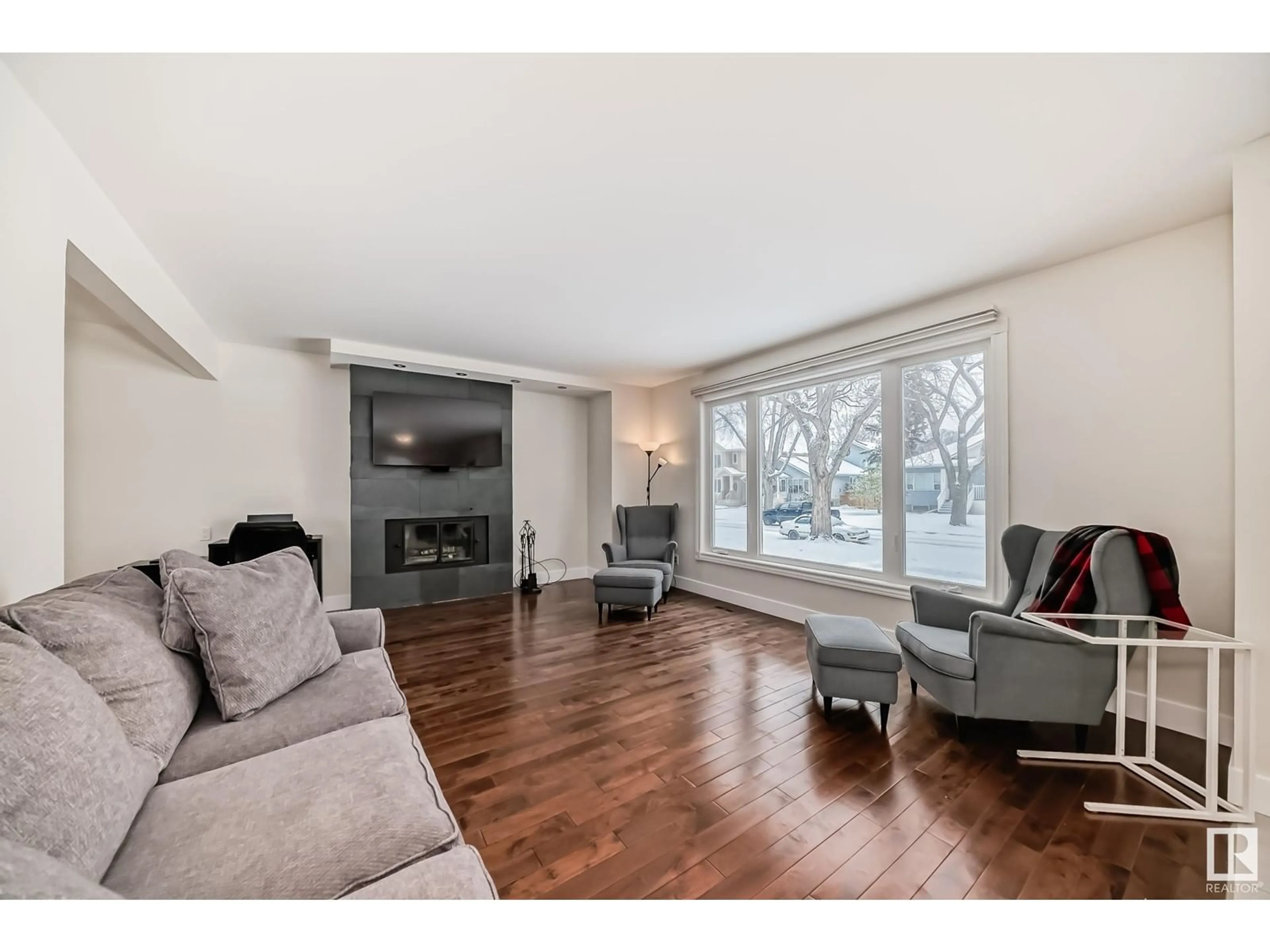 Living room, wood floors for 11022 126 ST NW, Edmonton Alberta T5M0P7