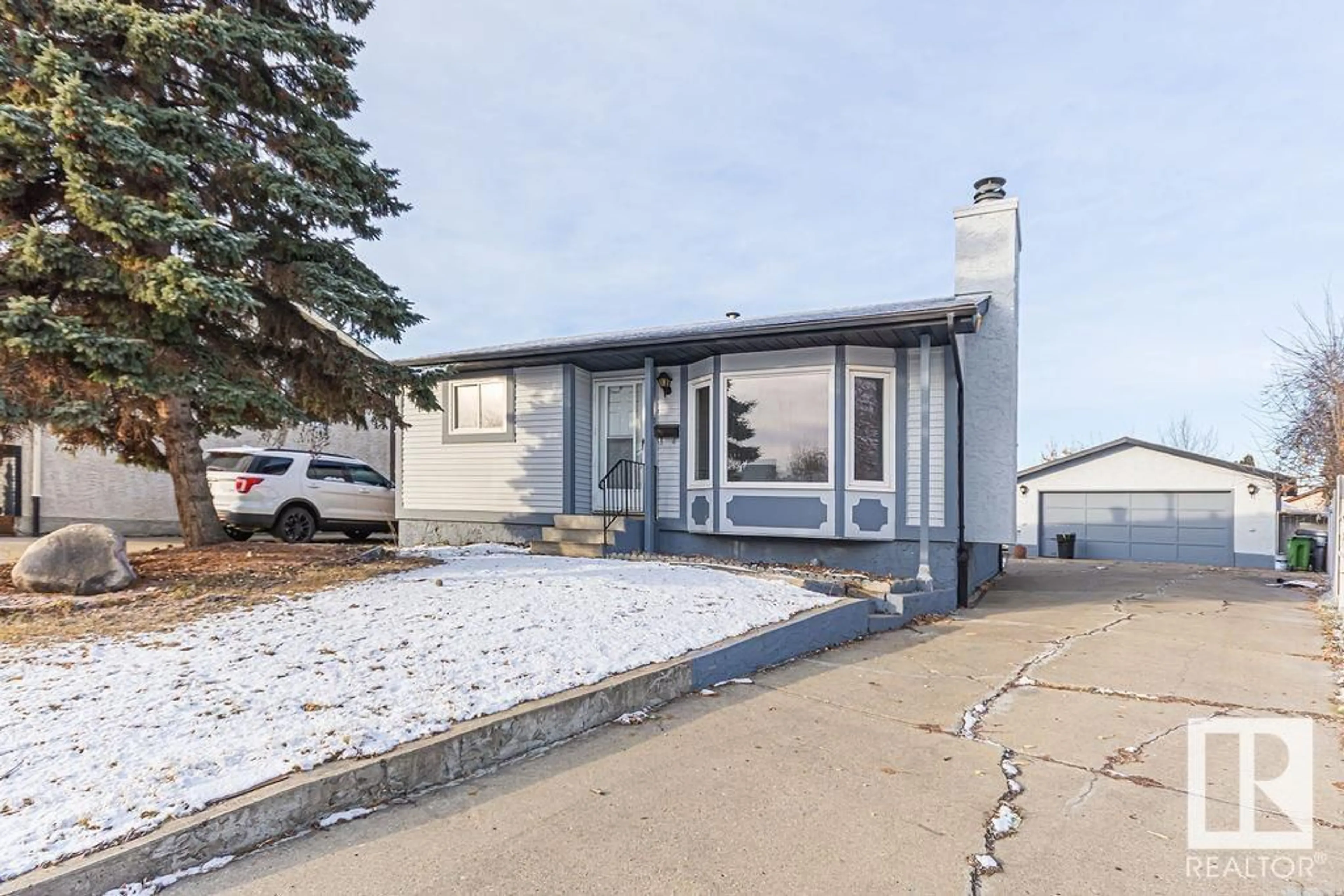 Frontside or backside of a home, the street view for 14540 20 ST NW, Edmonton Alberta T5Y1V7