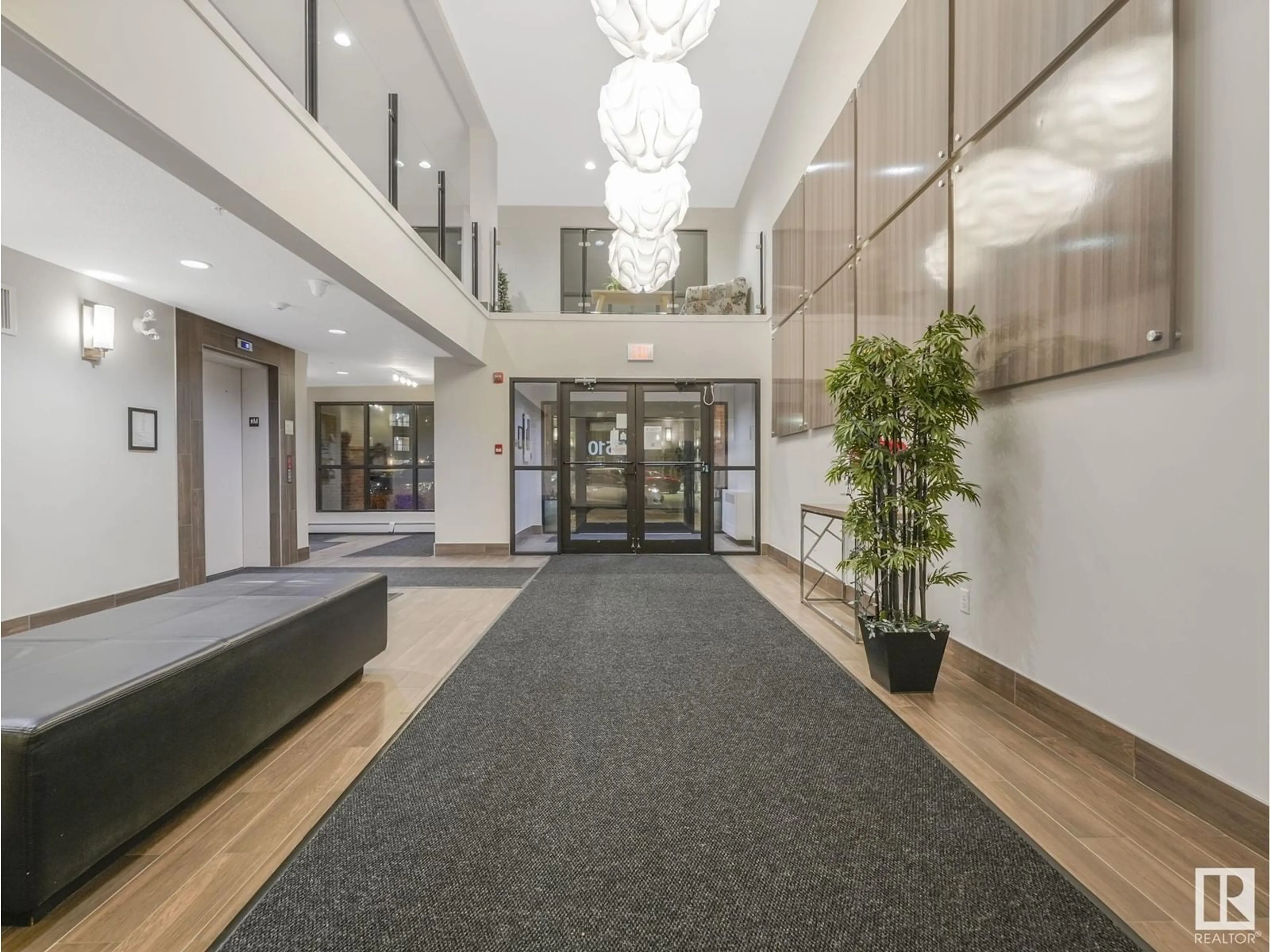 Indoor lobby, carpet floors for #216 5510 SCHONSEE DR NW, Edmonton Alberta T5Z0N9