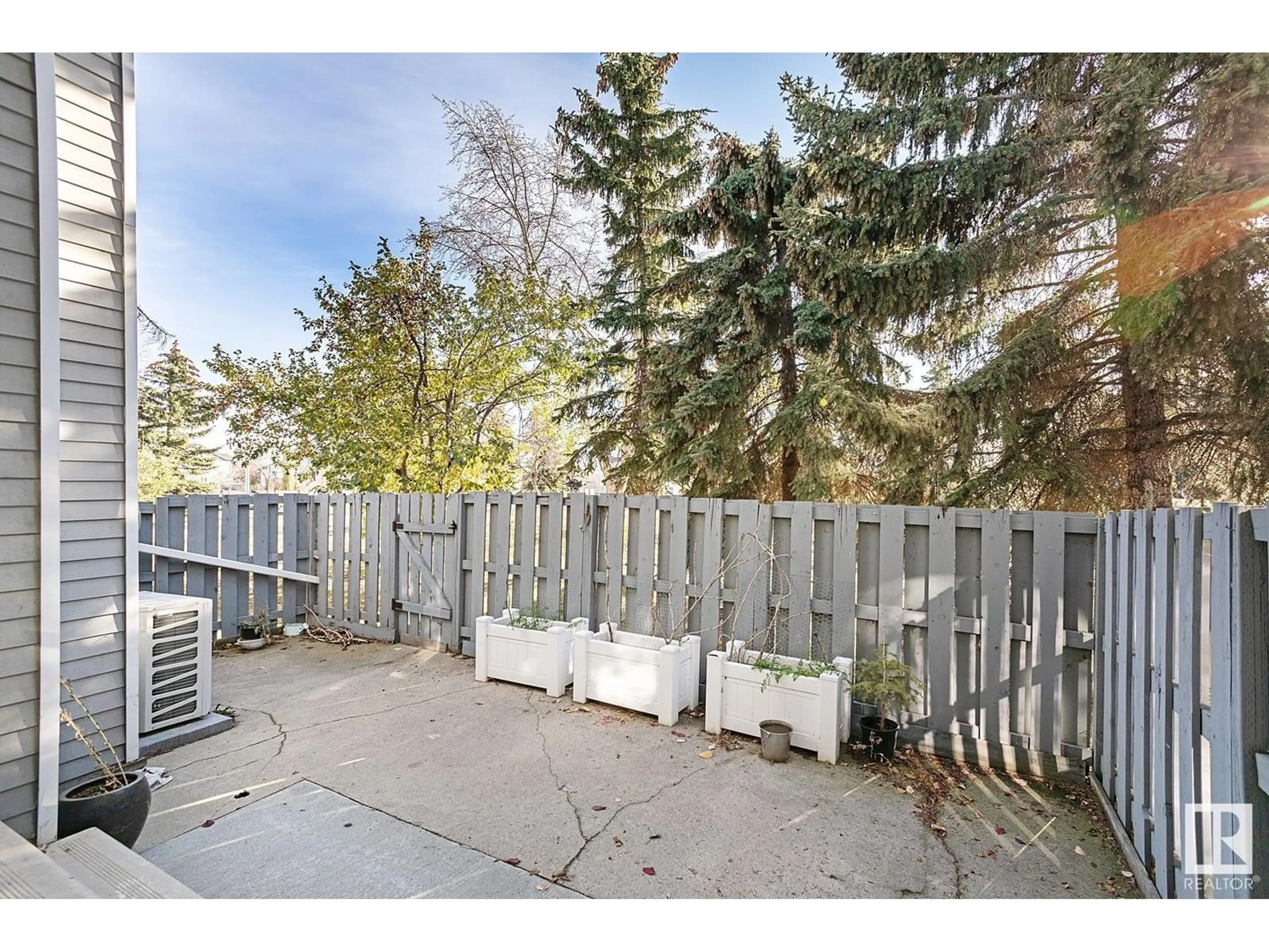 Patio, the fenced backyard for #7 15710 BEAUMARIS RD NW, Edmonton Alberta T5X5E2