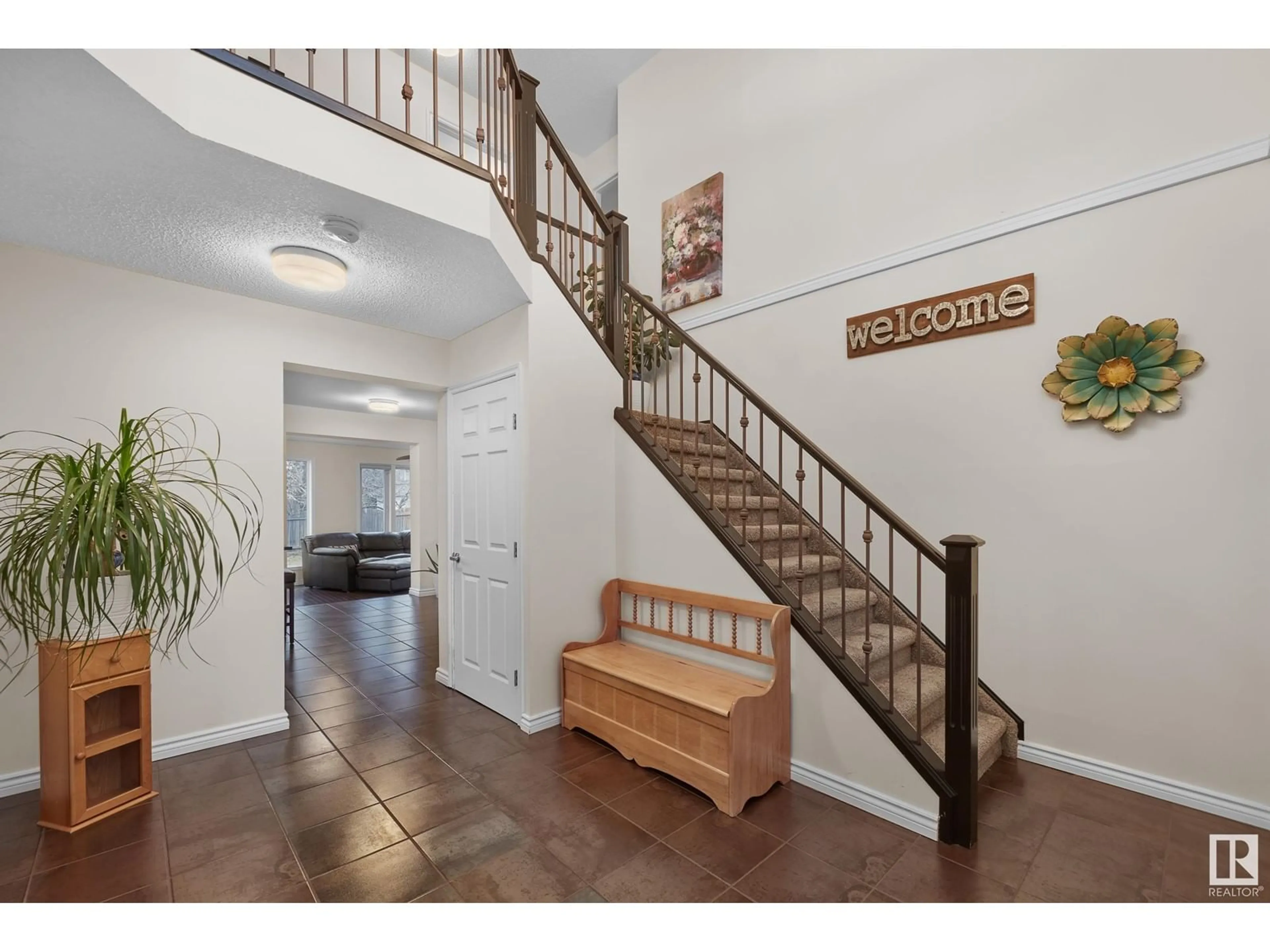 Indoor entryway, wood floors for 1428 104 ST NW, Edmonton Alberta T6J5R6