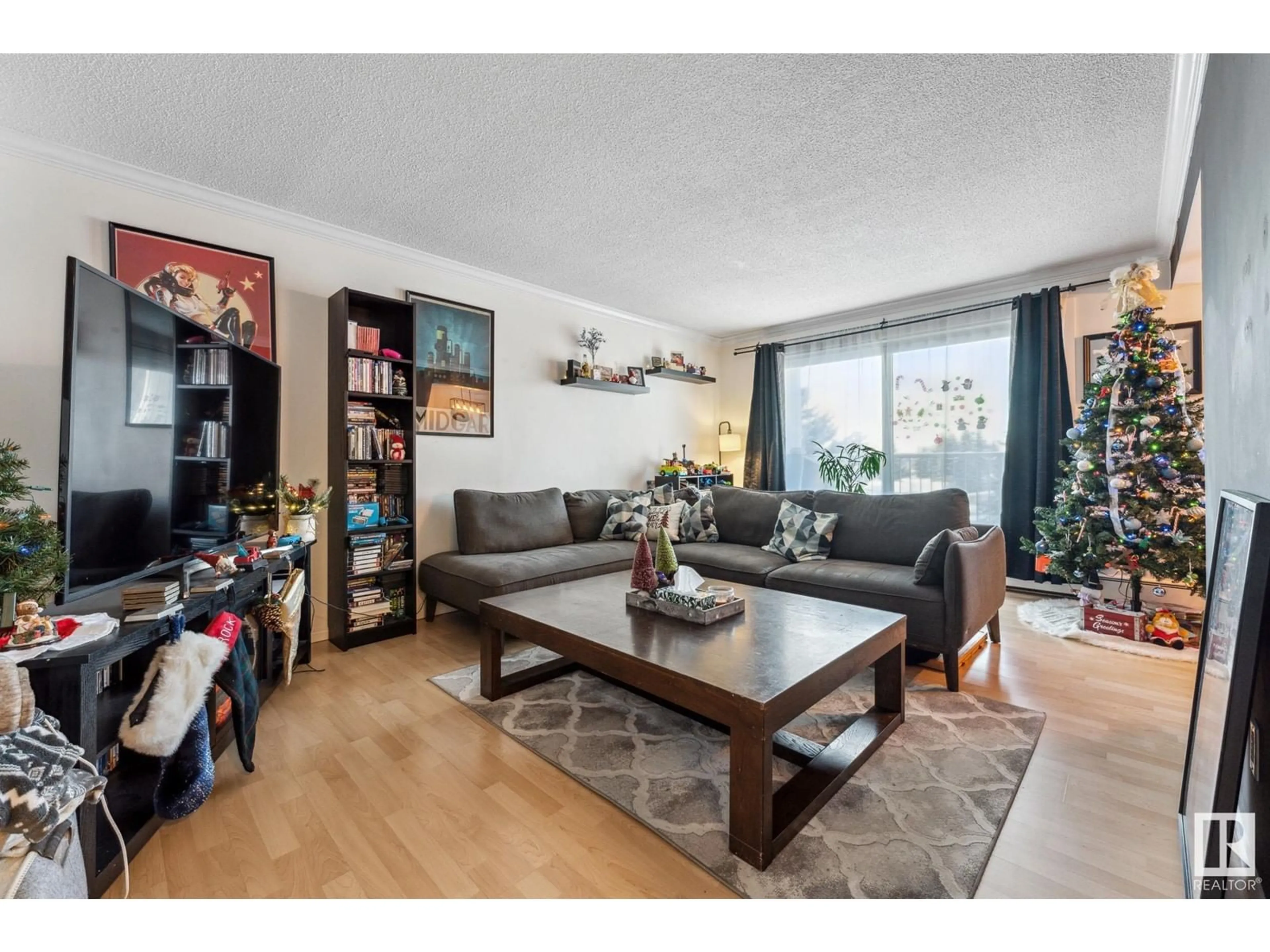 Living room, wood floors for #402 3835 107 ST NW, Edmonton Alberta T6N2N7