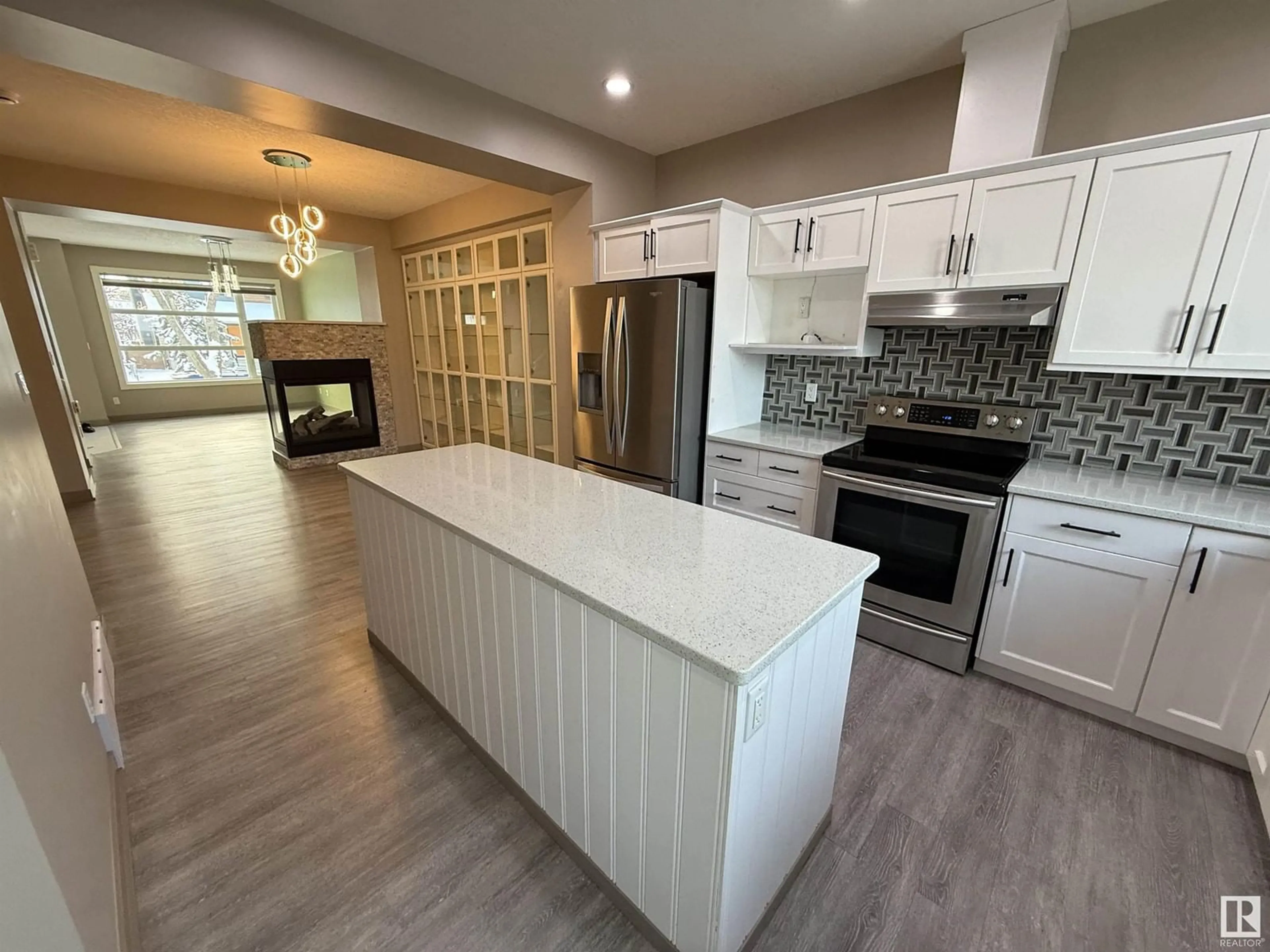 Open concept kitchen for 9824 73 AV NW, Edmonton Alberta T6E1B6